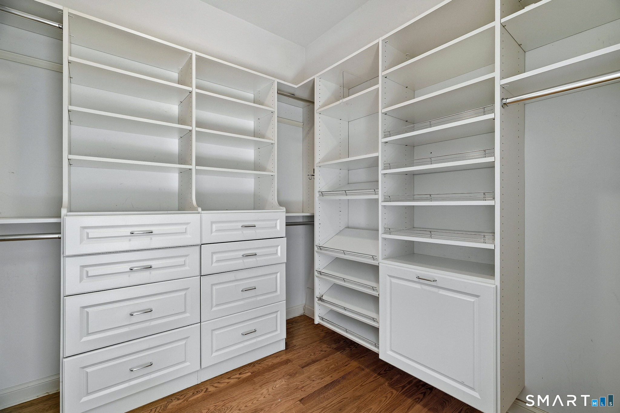 Primary suite built in closet shelves