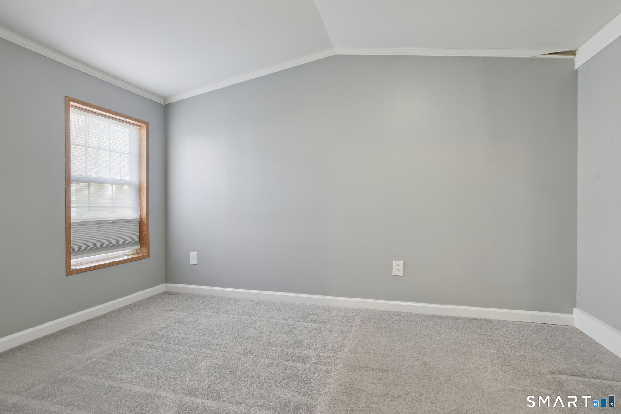 The larger of the two bedrooms