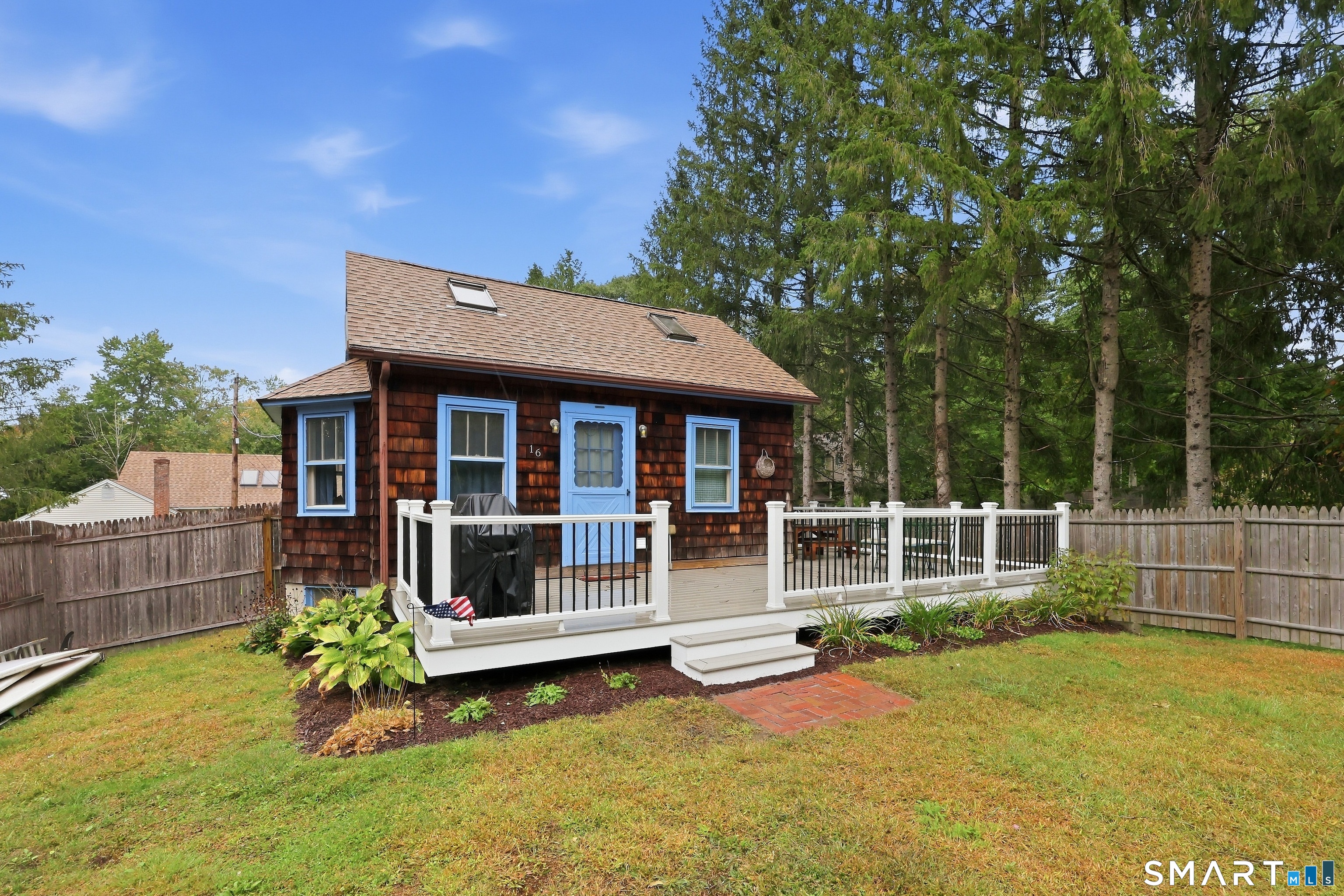 Cozy Year-Round Home with West Hill Pond Access Enjoy the best of lake living in this charming, move-in-ready home with access to beautiful West Hill Pond. The open floor plan creates a comfortable, inviting space that works well for both everyday living and weekend getaways. Designed for year-round use, the home features electric baseboard heat as well as a wood stove for added warmth and ambiance. The second-floor loft bedroom offers a cozy private retreat, while the full basement provides excellent storage and utility space. Beautiful wood floors add warmth and character throughout the main living areas. Step outside onto the new pressure-treated deck and enjoy the peaceful setting. The fenced-in backyard includes raised-bed gardens and a firepit, making it a wonderful space for gardening, relaxing, entertaining, or gathering around the fire after a day at the lake. The property fronts on both Beach Road and Pond Road, providing convenient access to the property and lake area. Please note that neither Beach Road nor Pond Road is maintained by the Town. Recent updates to the well and septic system provide additional peace of mind. With lake access, a year-round floor plan, outdoor amenities, and a comfortable, low-maintenance layout, this West Hill Pond property is ready to enjoy.