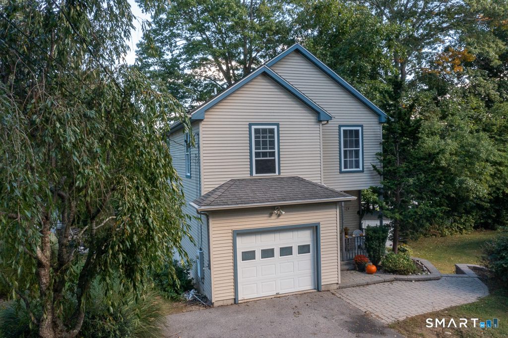 Photo 2 of Single family home for sale at 25 Oakwood Rd, Niantic, CT 06357 | MLS# 24211429 | Listing updated on 2026-10-06
