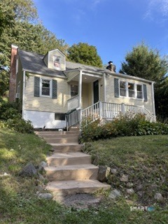 This charming Cape near Lake Zoar is great as a starter, vacation home or investment property. Main level features large living room with HDW floors, fieldstone fireplace, cathedral ceiling with tongue & groove ceiling. A slider leads to a private patio. and steps up to a level back yard. A bedroom with HDW floors, full bath and new shower. Also on the main level is a dining room and full kitchen with gas stove, refrigerator, dishwasher, washer & dryer. The open staircase leads to the second level primary suite with full bath and WW carpet. The full basement is concrete with outside access for ease of storage. Well & Septic. Updated vinyl windows. Enjoy low maintenance vinyl siding and shutters. Outside fireplace features inlaid vintage Lake Zoar bricks. Located on a private road with a country setting. One mile from state boat launch featuring boating, fishing, walking, biking, hiking opportunities. Short ride to shopping, dining, movie theater, golf, tennis, restaurants & Ballantine Park with inground pool and more. Close to I-84. Make this home your own with some updates. Full time or summer home. Great location.