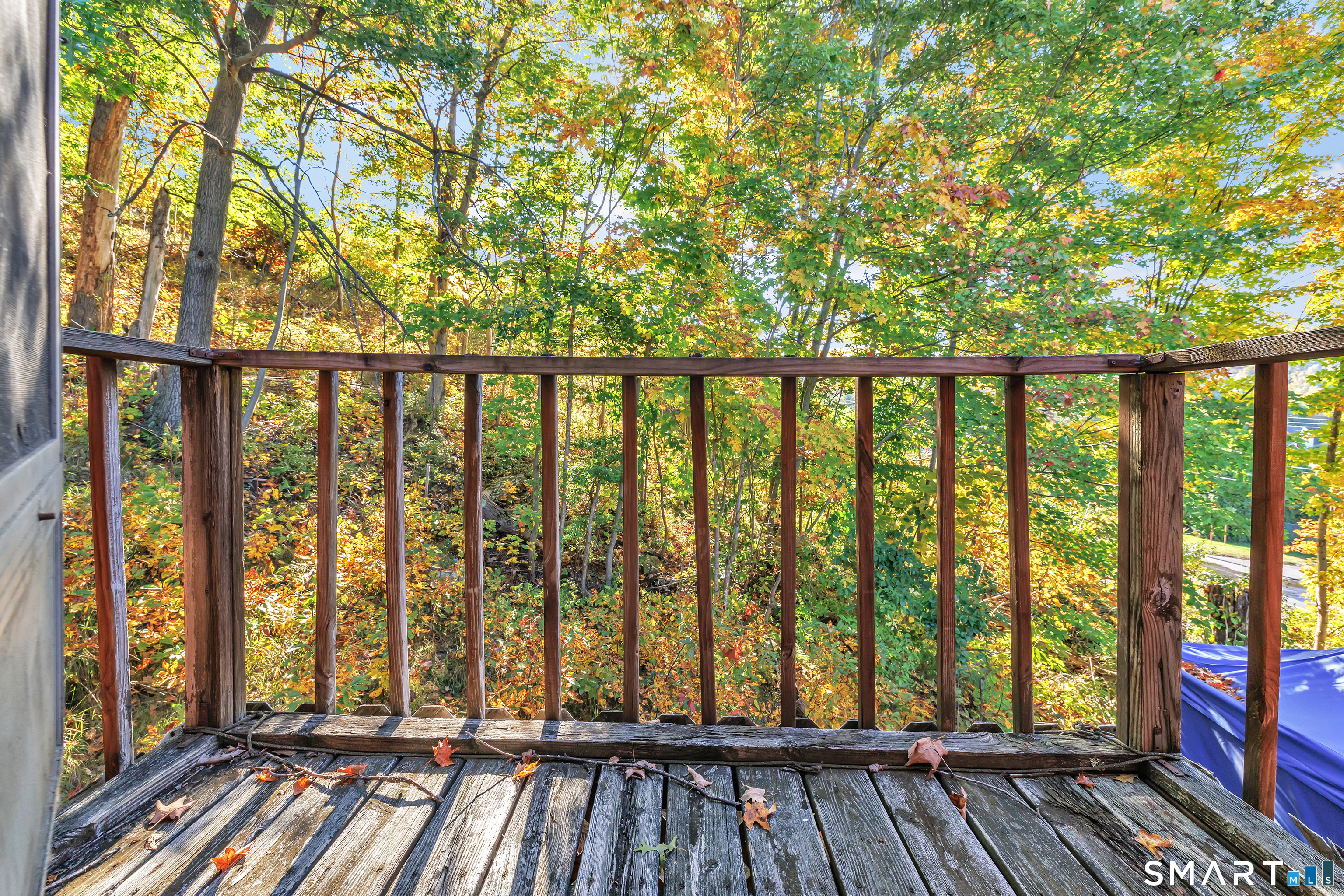 Upstairs - Small Wooden Deck off the bonus room from Primary Bedroom