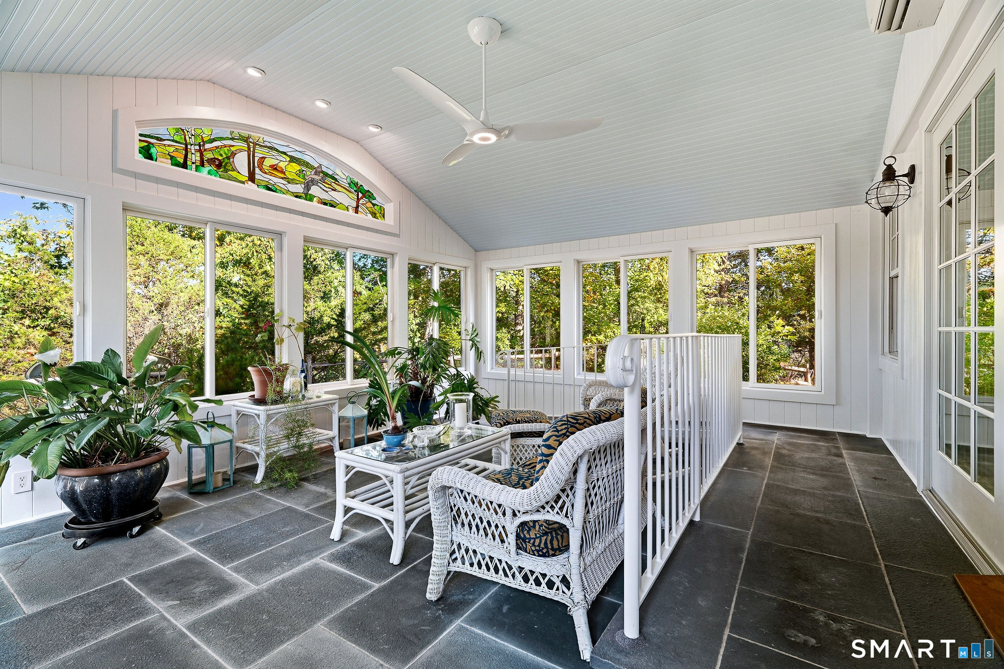 Four season sunroom with access to the patio