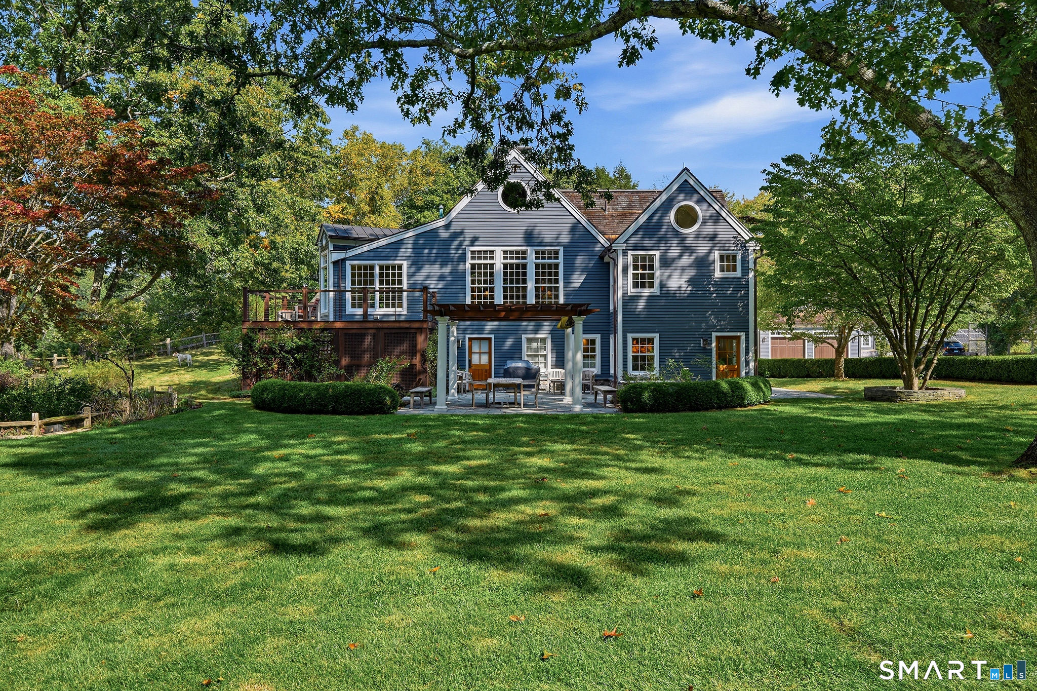 Upper and lower level decks and terraces lead to the grounds or the water. Find hard piped gas for cooking, and pre-wired for spa. Fully irrigated grounds.