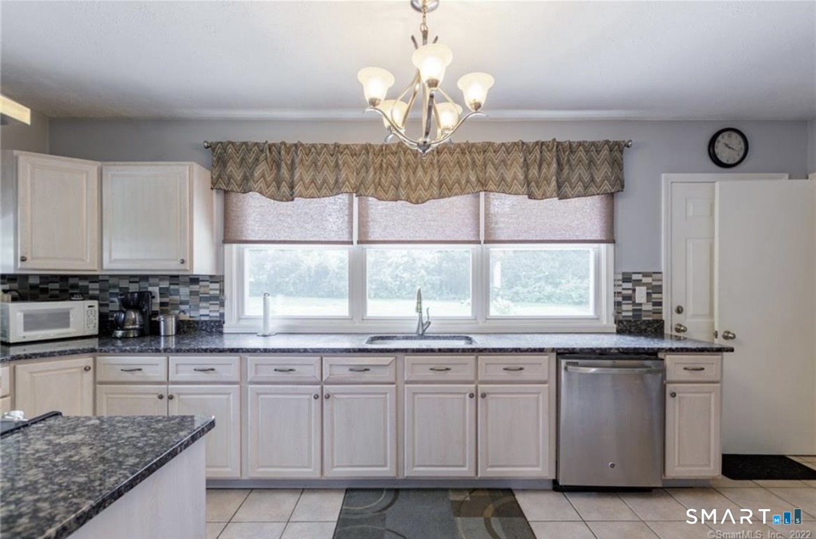 Photo 1 of Single family home for sale at 433 Highland Dr, Waterbury, CT 06708 | MLS# 24212924 | Listing updated on 2026-10-08