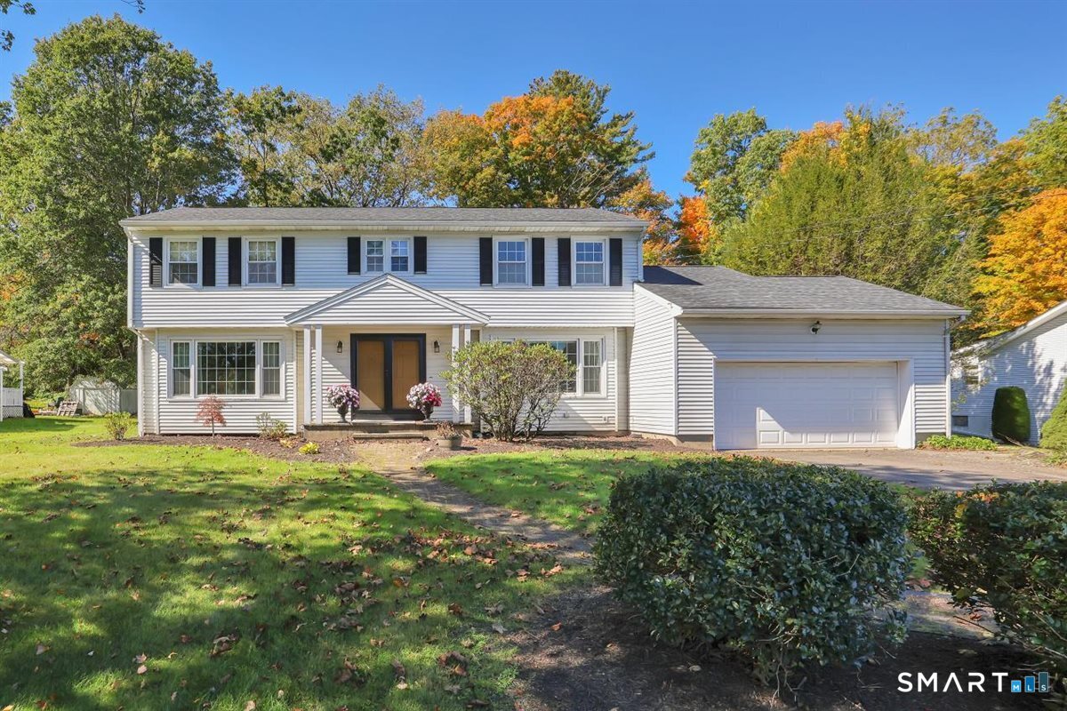 Welcome to a home where space, versatility & timeless appeal come together! Set on a generous .42 acre lot in a desirable location near major highways, medical offices & restaurants. This impressive residence offers space, complemented by an additional unfinished basement space with exceptional potential. A grand foyer welcomes you in to a thoughtfully designed interior layout with generously sized rooms & space for both everyday living and entertaining. The large living room provides an elegant gathering space, while the expansive office/den offers flexibility of use & allows access to the beautiful sunroom & deck. The formal dining room flows seamlessly into the spacious eat-in kitchen, featuring double ovens, lots of storage & counter space for meal prep & entertaining. Upstairs, four generously sized bedrooms provide space for everyone. The impressive primary suite features a walk-in closet and private full bath with shower stall. There is an additional full bath with double sinks on the upper level and a large 1/2 bath on the main floor for guests. A finished room in the basement currently being used as a game room adds additional space. Step outside onto the deck and enjoy the expansive yard, supported by an irrigation system for added convenience. A two car garage & large driveway for plenty of parking, public water/sewer, natural gas & central air are just a few additional features that make this property exceptional!