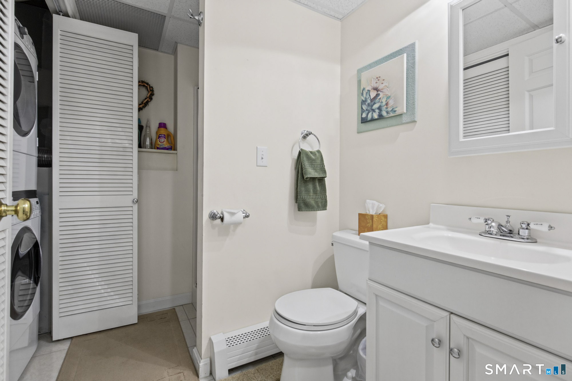 Full shower, sink, toilet and laundry in the basement level...