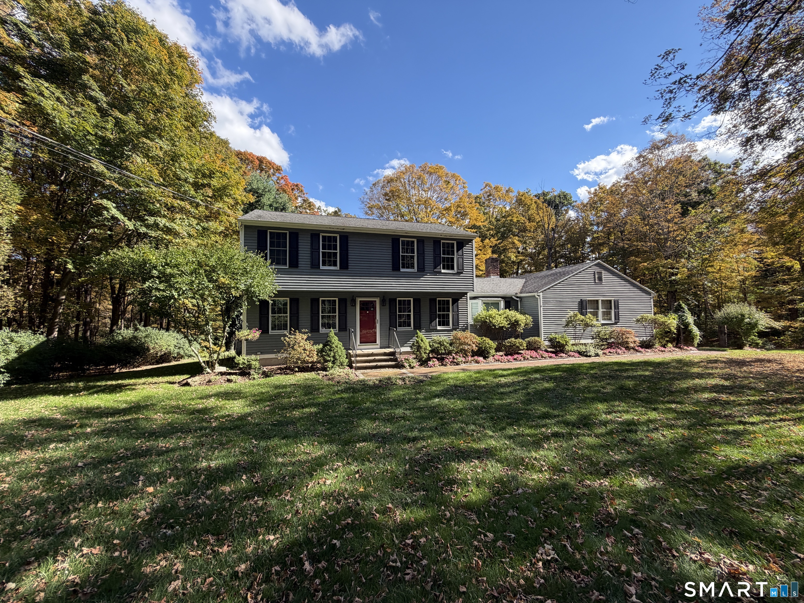 Rare opportunity on a great Hamden street! This well-maintained 1987 Colonial sits on a sprawling 1.46-acre lot and offers 7 rooms, 3 bedrooms and 2 full baths across 1,816 sq ft. Inside you'll find hardwood floors, a fireplace, central air and a functional two-story layout. The home has been well cared for and is in great overall condition. It's a bit dated and ready for your personal updates, which makes it an ideal chance to add your own style and build equity. Step outside to an expansive 476 sq ft rear deck overlooking a huge yard, perfect for entertaining, gardening or simply relaxing. Car enthusiasts, contractors and hobbyists will love the enormous 3-car garage. Priced aggressively for the right buyer, because opportunities like this don't come along often. Delivered vacant at closing. Schedule your showing today!
