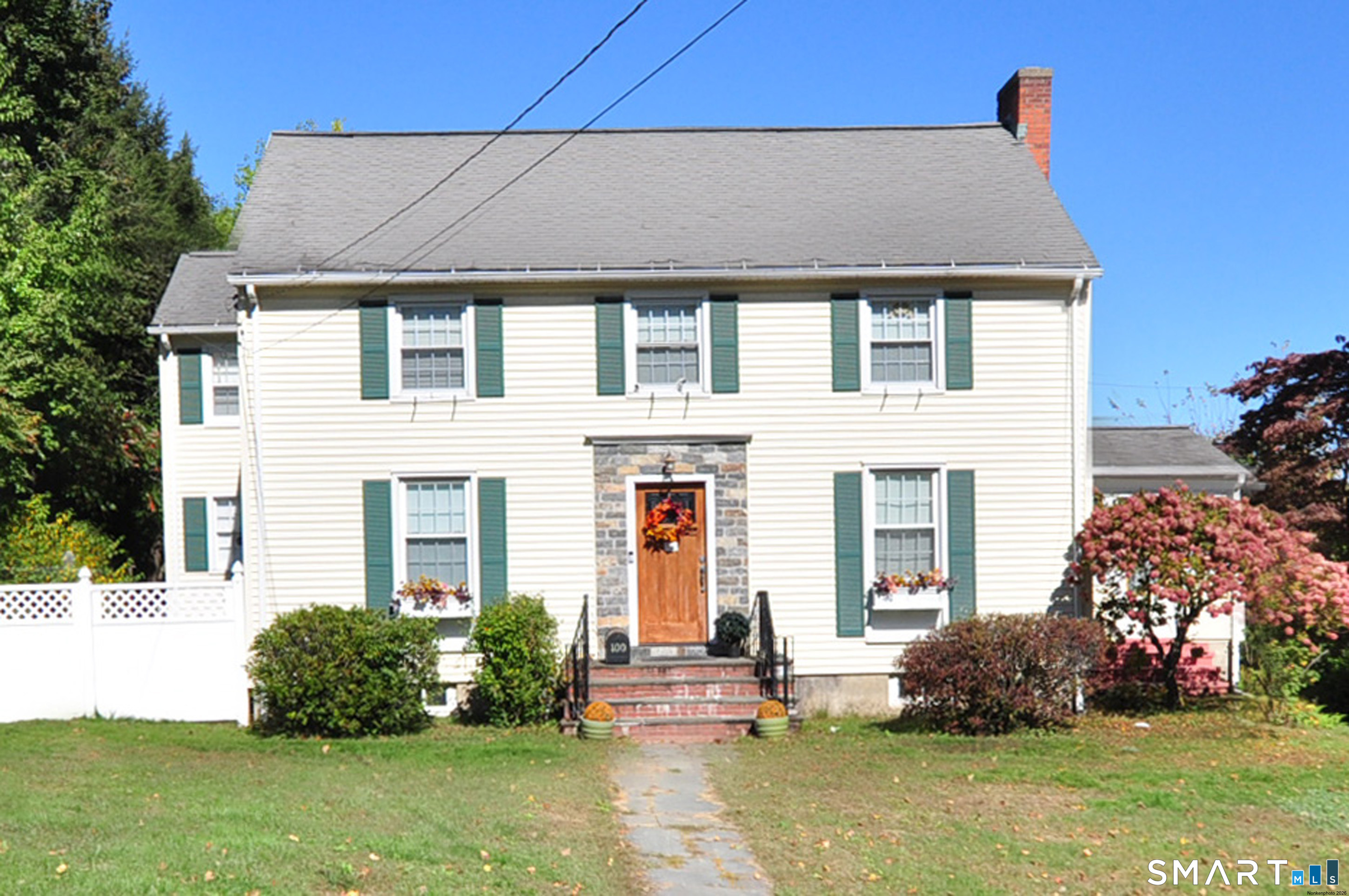Welcome to this charming Colonial in Waterbury's Bunker Hill neighborhood. Set on a 0.43-acre corner lot, this 3-bedroom, 2.5-bath home offers 1,898 square feet of above-grade living space plus a 949-square-foot finished basement. Hardwood floors and a wood-burning fireplace bring warmth to the living room, while the finished lower level features a gas fireplace and flexible space for recreation, relaxing, or entertaining. Two enclosed porches add to the home's charm. Step outside to a private backyard retreat featuring an in-ground saltwater pool, hot tub, and patio. An attached two-car garage and private driveway complete this distinctive property.