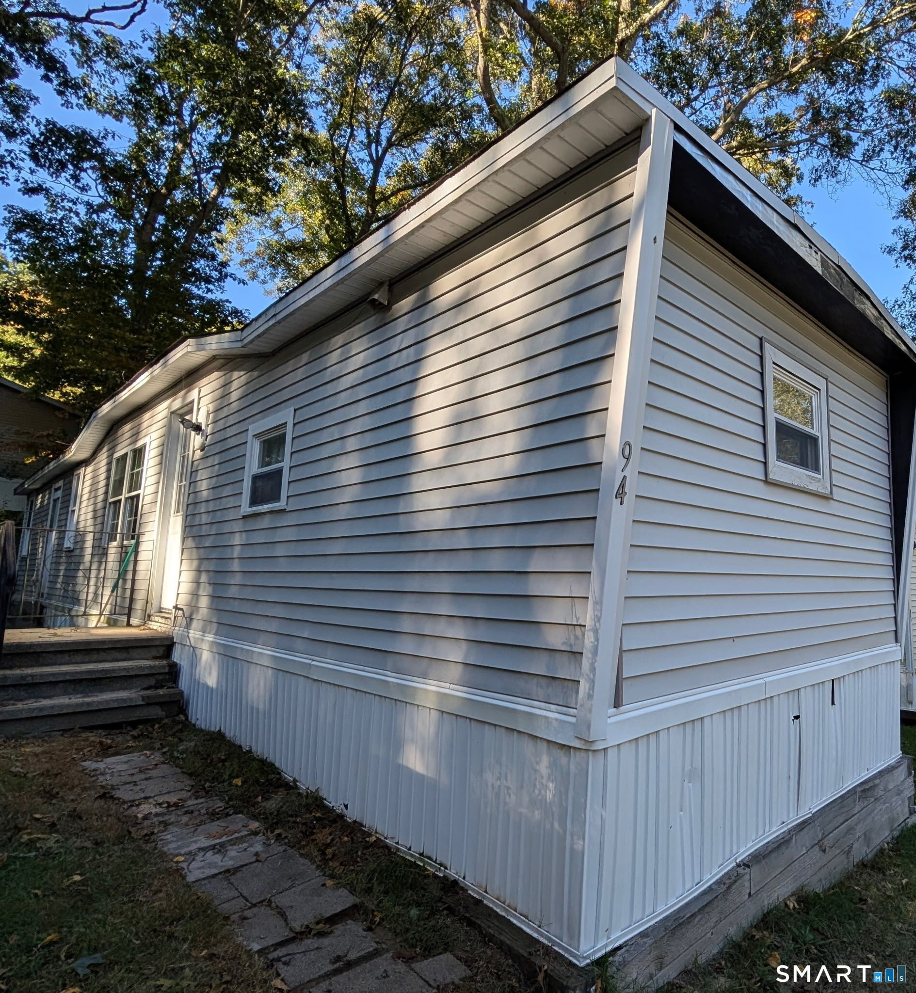 Photo 2 of Manufactured home for sale at 303 Mohegan Park Rd #LOT 94, Norwich, CT 06360 | MLS# 24210464 | Listing updated on 2026-10-09