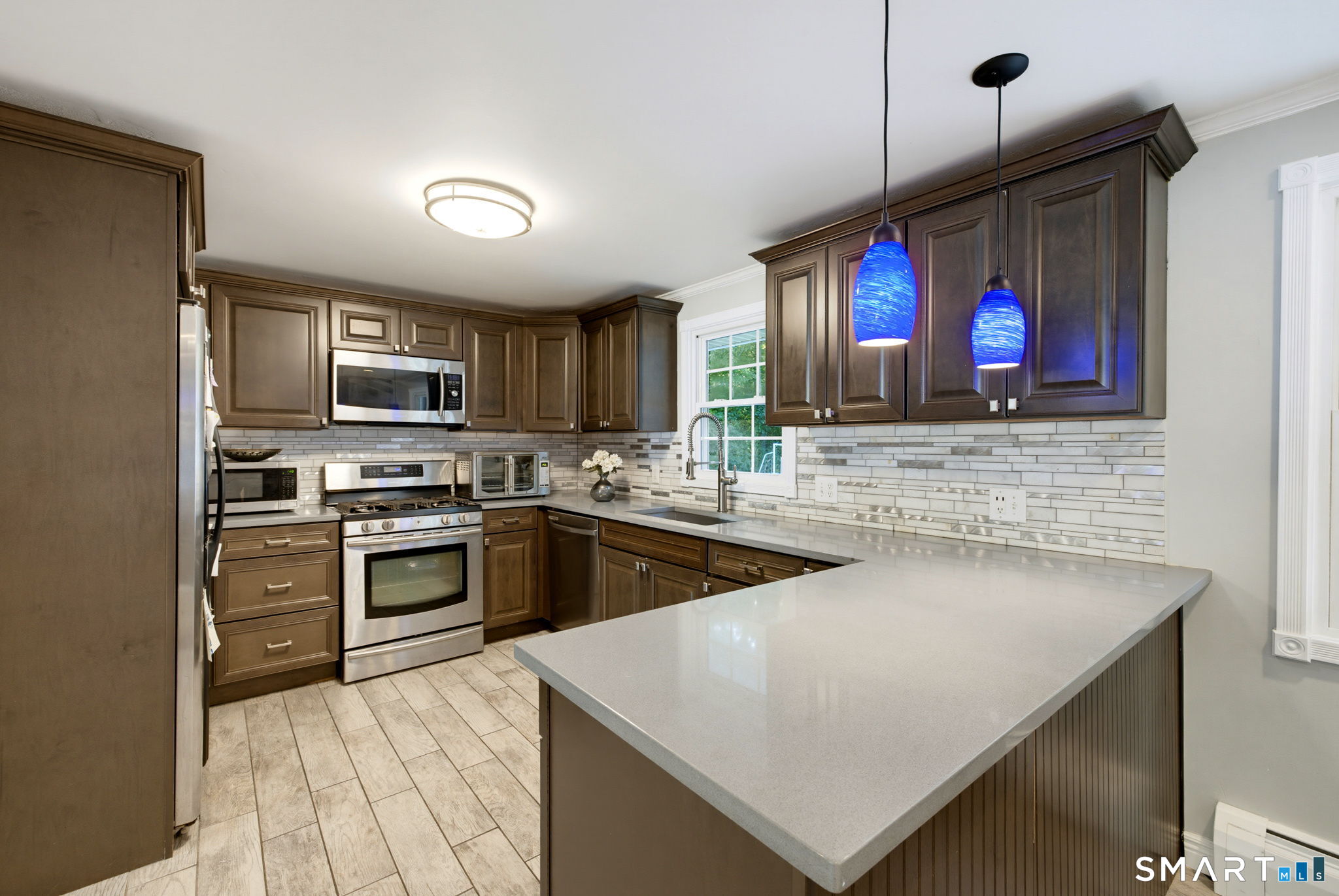 Photo 4 of Single family home for sale at 67 Wooddale Dr, Unionville, CT 06085 | MLS# 24212274 | Listing updated on 2026-10-09