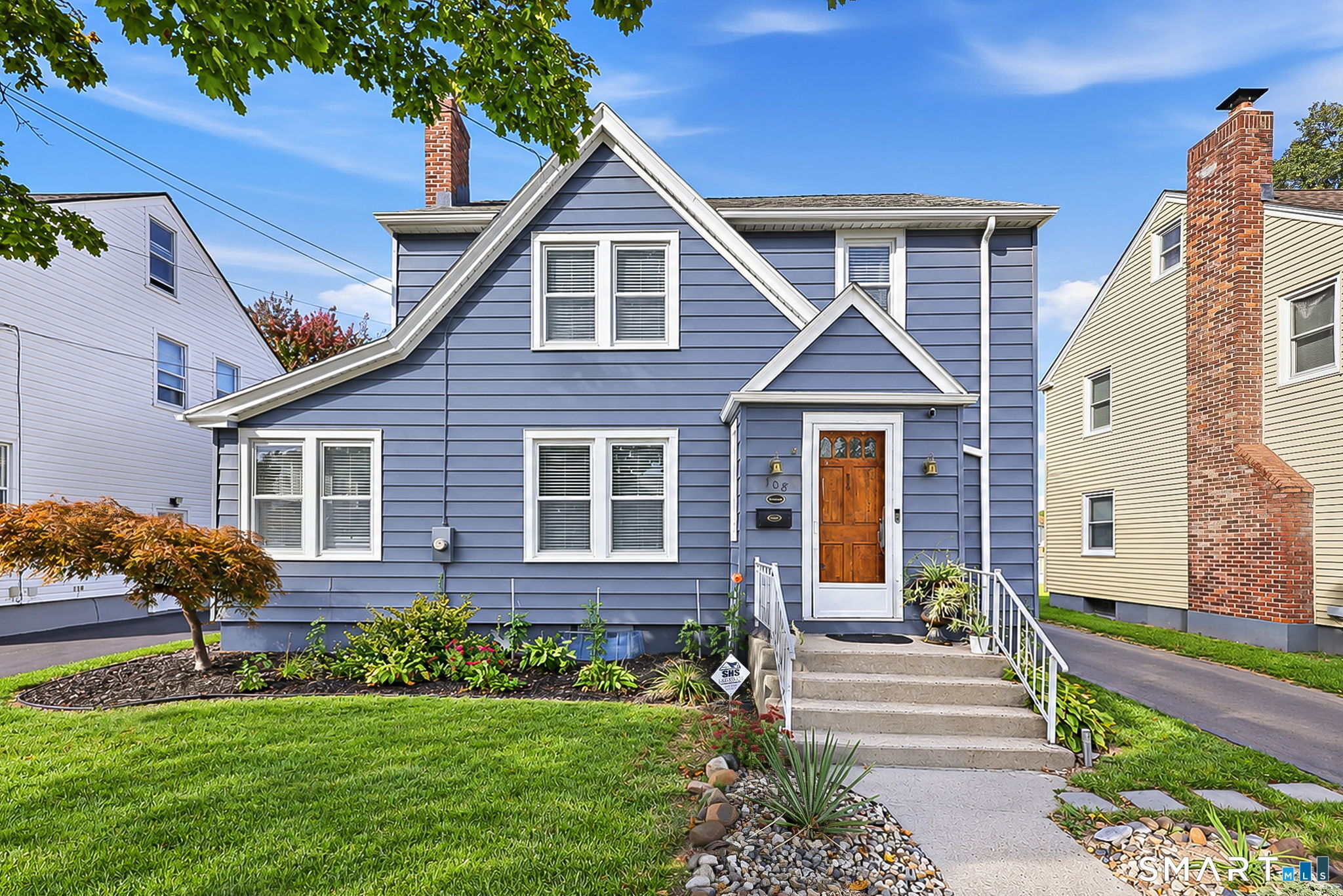 Welcome to this charming, move-in-ready Colonial in Hartford's desirable South End! This three-bedroom, two-bath home features hardwood floors and an open floor plan. Enjoy a spacious living room with a wood-burning fireplace, a dining room perfect for entertaining, and an eat-in kitchen with white cabinetry and granite countertops. A lovely sunroom offers a peaceful retreat. The main level includes a full bathroom with a shower stall. Upstairs, you'll find a primary bedroom with closets, two additional bedrooms, and a full bathroom off the hallway with a tub and shower combination. A pull-down attic provides extra storage. The unfinished lower level offers storage and potential to finish and customize. This level includes a laundry area, hot water tank, and oil tank. Natural gas is available on the street. Enjoy the beautiful backyard and deck, perfect for relaxing or entertaining. A mudroom accessed through the back door adds everyday functionality. A detached two-car garage and a driveway with ample parking add to the home's appeal. Don't miss this opportunity to make this charming Colonial yours.