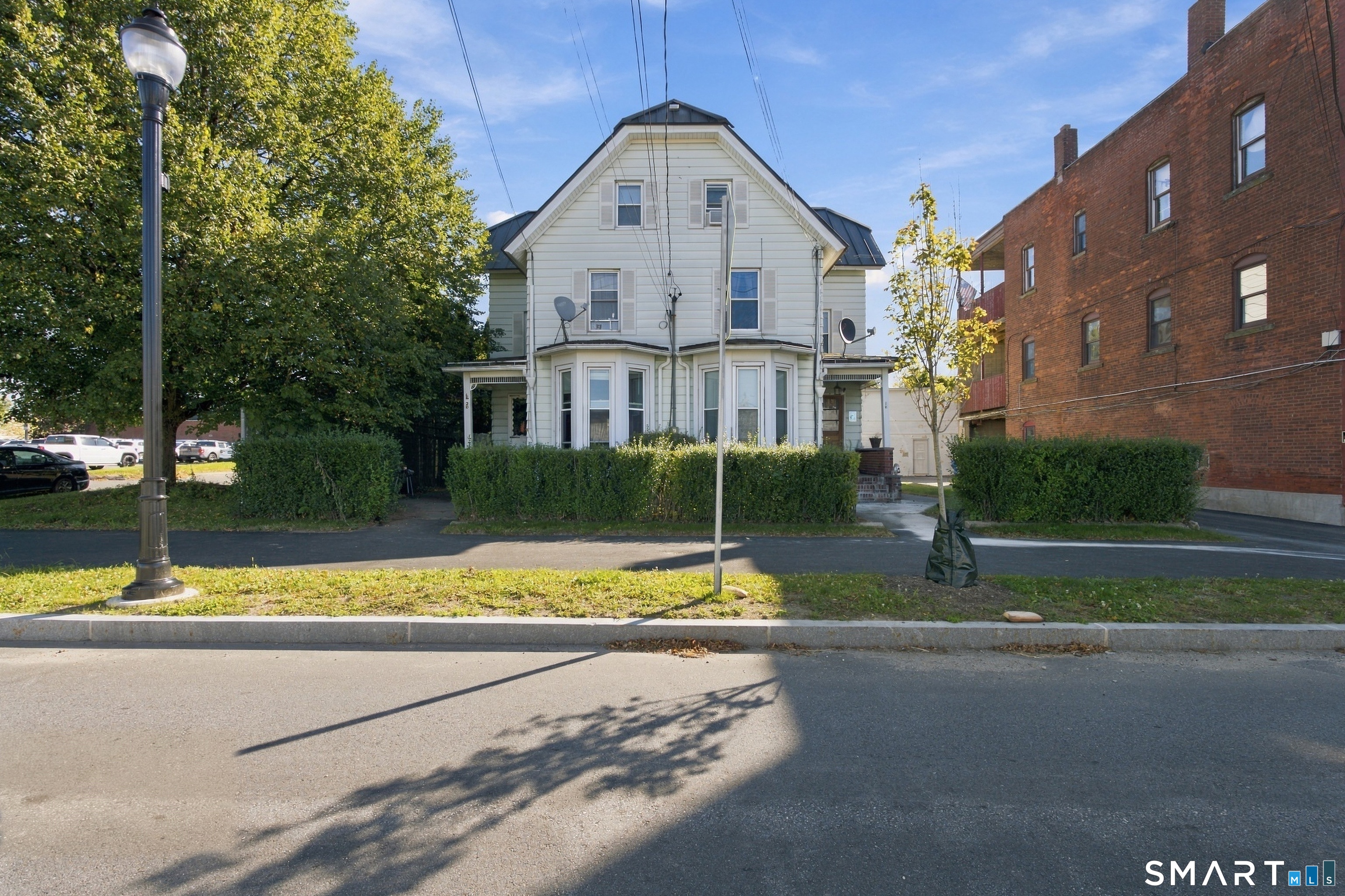 Photo 1 of Multi family home for sale at 18 20 John St, Torrington, CT 06790 | MLS# 24211828 | Listing updated on 2026-10-10