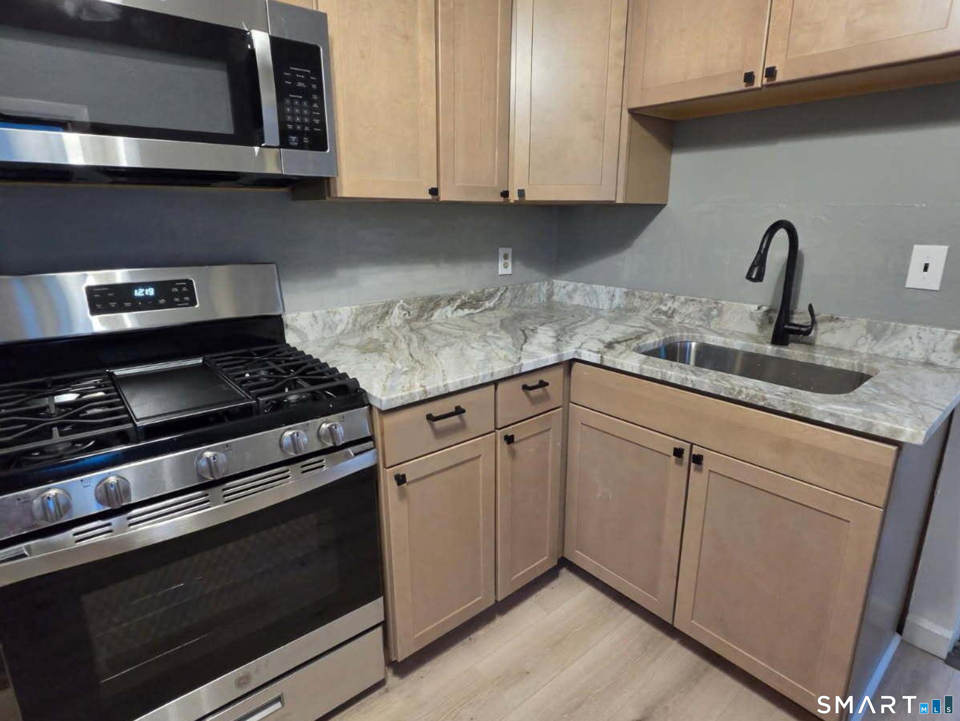 Photo 4 of House for sale at 49 Monahan Pl, West Haven, CT 06516 | MLS# 24196496 | Listing updated on 2026-10-09