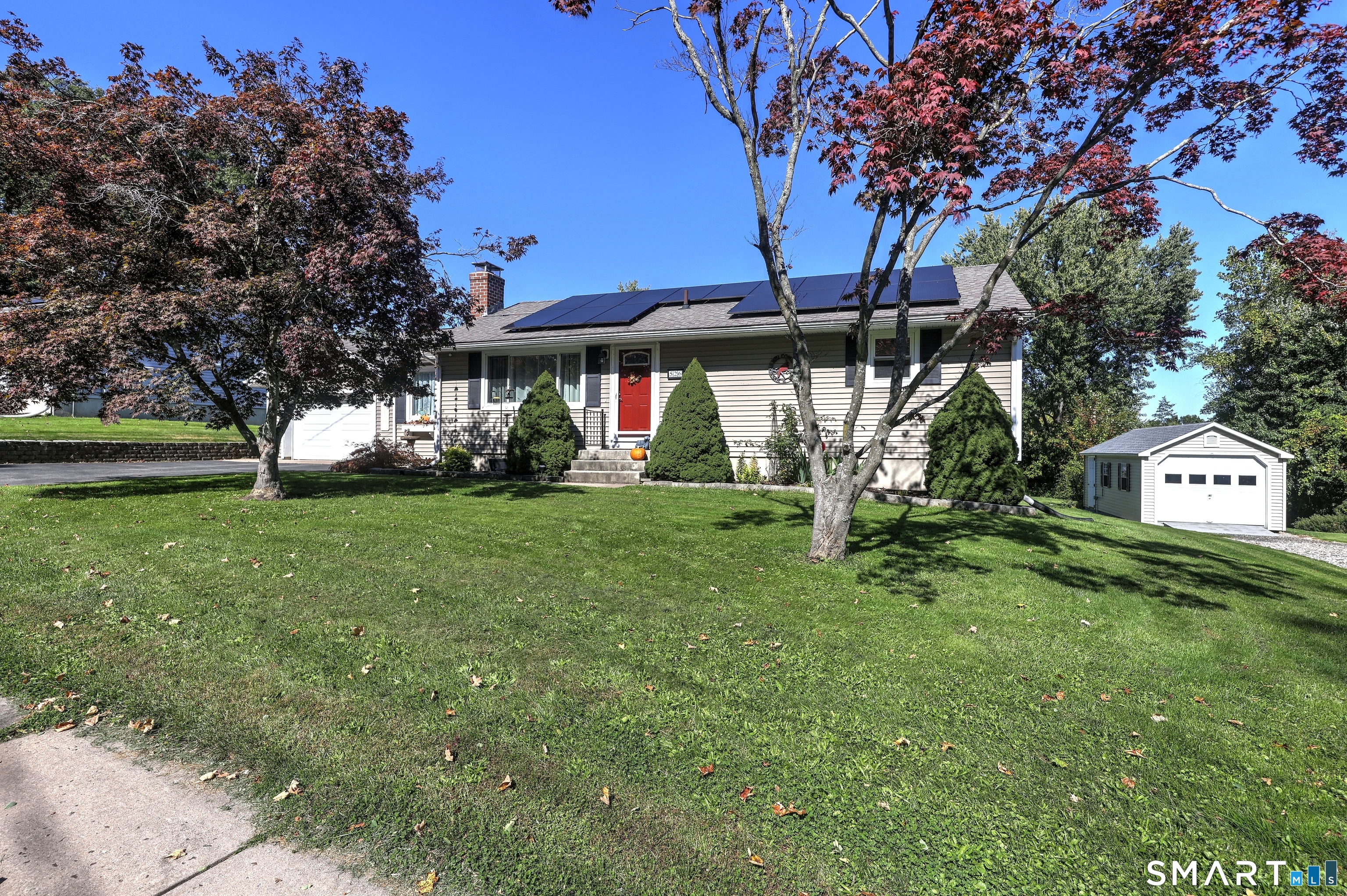 Lovingly updated and maintained one floor living featuring a roomy eat in kitchen, living room with fireplace. A large primary bedroom with sliders to the deck, provides a large walk in closet an en suite bath with walk in shower and jet tub. The floors throughout the principal rooms of the home are hardwood with the exception of the kitchen and baths with tile flooring. There are two other bedrooms and a family bath also with a walk in shower. The current owners added a one car detached garage, installed a new oil tank and added a very useful workbench in the basement section where double doors allow for entry of their sit down mower. There is a nest system to make off site adjustments to heat and A/C and exterior cameras that are not currently connected to police, fire departments but could be.  The deck is two tiered, has a gazebo and is the perfect spot for friends and families to gather. The rear yard is fully fenced for those who have pets that can enjoy a protected outdoor area.  Please allow at least 2-3 hours notice to show.