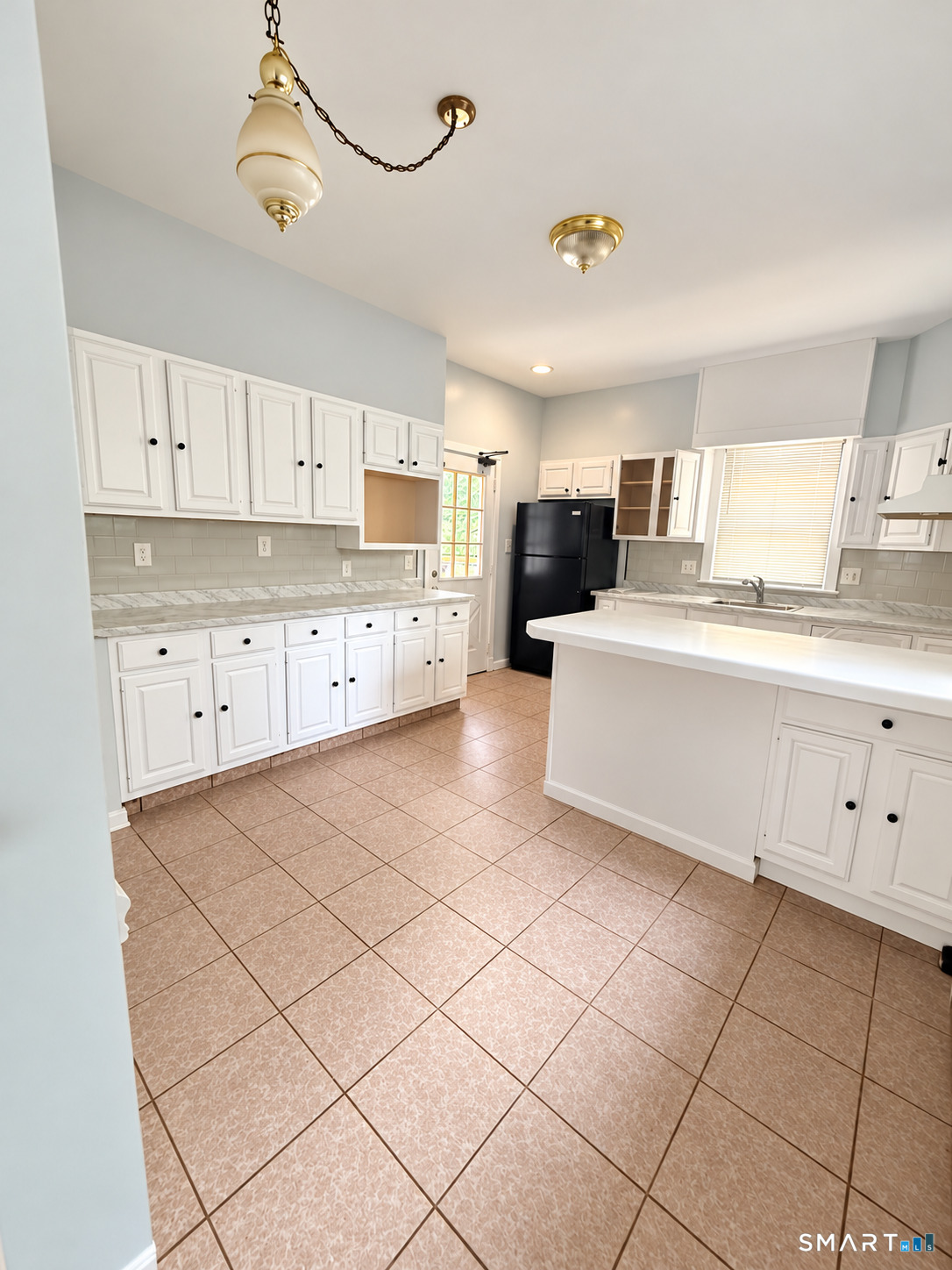 Welcome to 115 Third Street in Hamden-a spacious home offering 4 bedrooms and 2 full baths. Enjoy a comfortable layout with a bright living area, an attached 1-car garage, and a partially finished basement that offers flexible space for a home office, gym, or playroom-all within minutes of local shops, restaurants, and commuter routes. Move-in ready and easy to love!