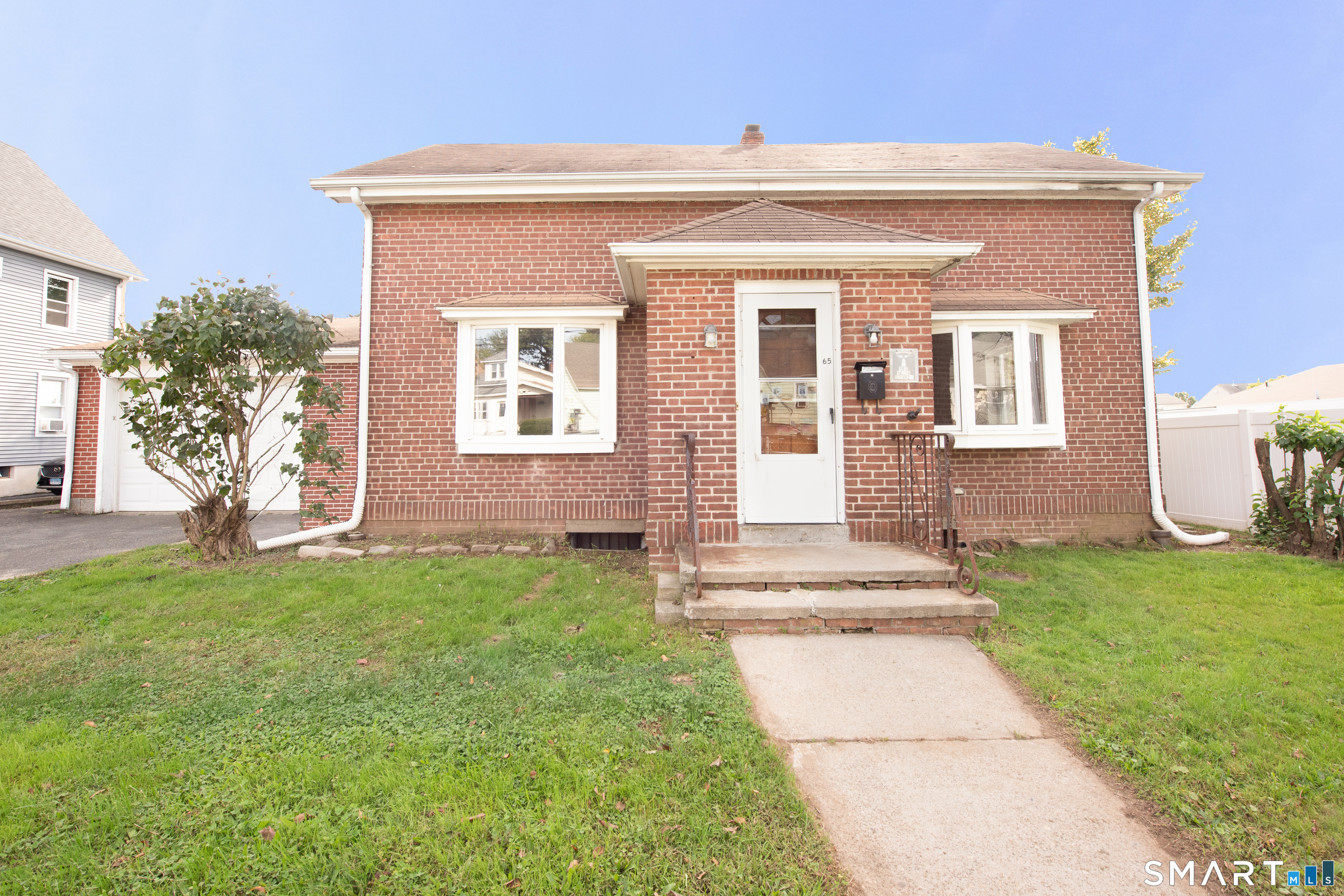 Foto 1 de Casa en venta en 65 Arlington Street, Bridgeport, CT — $389,900