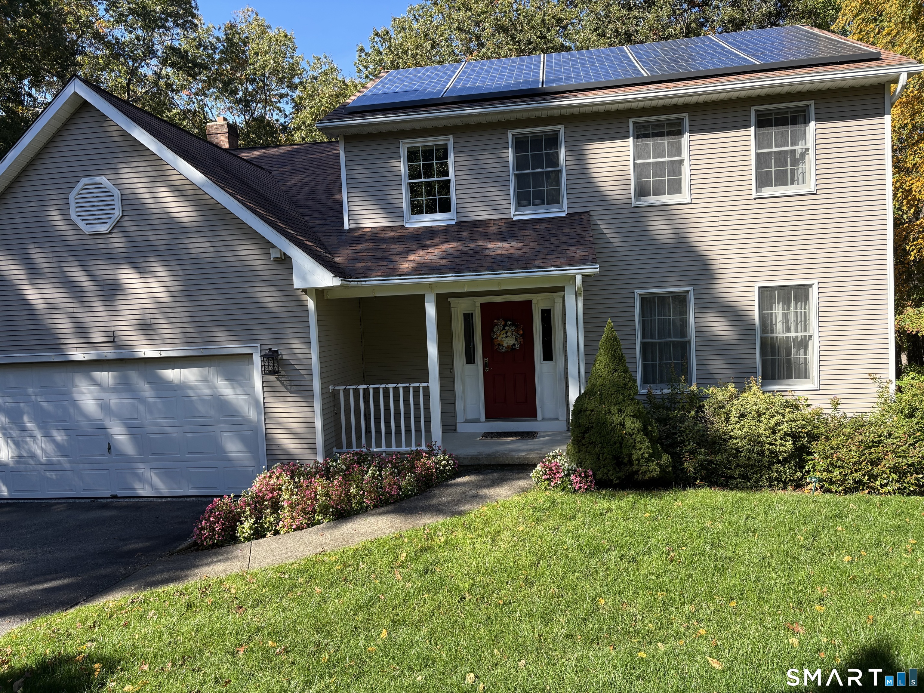 Welcome to this beautiful Colonial, offered for the first time since it was built in 1994! Tucked away on a cul-de-sac in a well-established neighborhood, this home offers a peaceful setting, timeless appeal, and thoughtful updates throughout. Featuring three bedrooms plus a versatile bonus room over the garage, complete with a closet and currently used as a fourth bedroom, there is plenty of space to accommodate a variety of needs. The home has been lovingly updated over the years, including a kitchen remodel in 2011, a downstairs bathroom renovation in 2010 and refreshed primary bathroom in 2023. Hardwood floors were added to the family room in 2018, while other hardwood floors were refinished to enhance the home's warmth and character. Additional improvements include a new roof and LeafGuard gutter protection in 2016, solar panels, and an instant hot water heater (2019) for added efficiency and convenience. For a special touch, the basement features a separate cedar lined room with a hot tub, creating a relaxing, private retreat to unwind a the end of the day. Combining classic Colonial charm, meaningful updates, and a tranquil cup-de-sac location, this property is a wonderful opportunity to own a well-maintained home in a beautiful, established neighborhood.  Don't miss your chance to make this first-time offering your own!