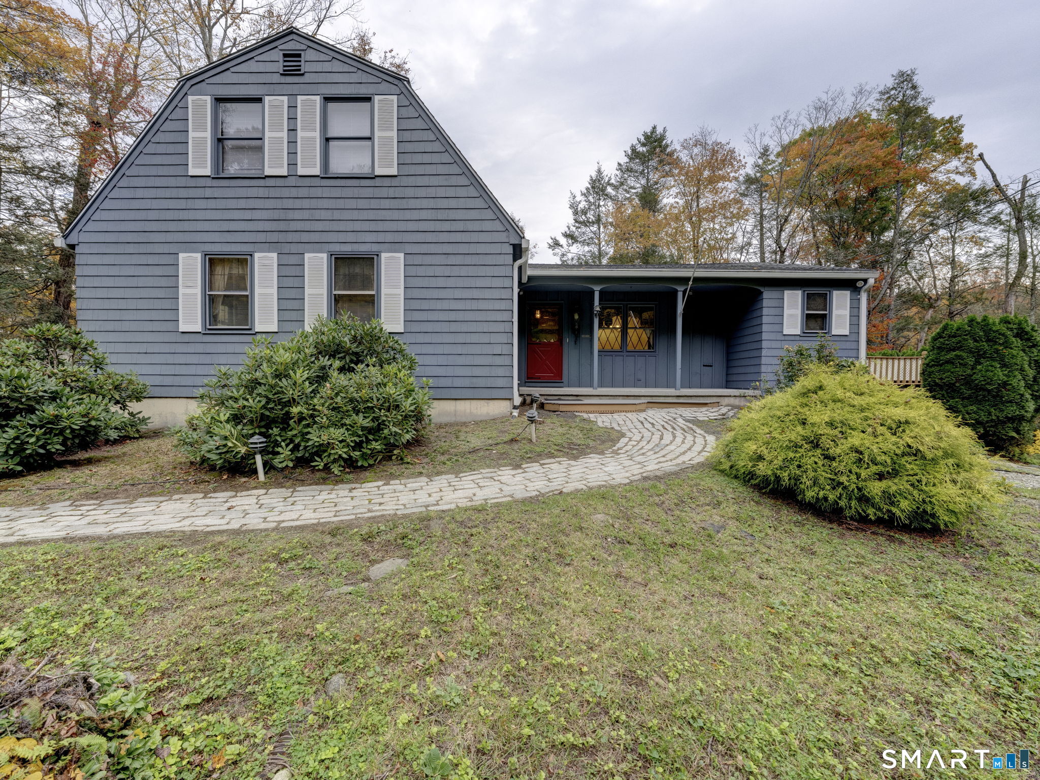 Nestled on a quiet cul-de-sac, this charming Colonial the perfect place to call Home. Currently finished in a ranch-style layout, the home features additional expansion potential on the upper level (totaling approximately 900 square feet.) The main living area boasts an inviting open-concept living and dining room with beautiful hardwood floors, a cozy fireplace, and rustic wood beams that add warmth and character. The spacious kitchen is ideal for entertaining, offering a separate dining area and a convenient pantry to keep all your culinary essentials organized. The finished lower level provides additional living space, complete with a second fireplace, a half bathroom, and a dedicated laundry room. Lovingly cared for and well maintained, this home features numerous updates, including a freshly painted exterior in 2024. Step outside and unwind on the private deck, where you can enjoy the peaceful surroundings and natural beauty of the property. Additional highlights include two ductless mini-split units for air conditioning, dual 330-gallon oil tanks replaced in 2022, and a brand-new furnace to be installed prior to closing. With its inviting character, flexible living space, and room to grow, this home is a wonderful opportunity to enjoy comfortable living in a peaceful setting.