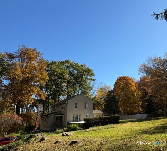 **Charming Colonial with Lake Rights to Lake Harwinton** Discover the charm and character of this inviting Colonial built in 1940 in move in condition. Features include: 3 bedrooms, two full baths, two car garage, spacious three-season porch, deck plus whole house generator for added piece of mind. Enjoy the spacious three-season porch, perfect for relaxing, entertaining, or enjoying the outdoors in comfort. The home also features replacement windows, a convenient laundry/office room, and lovely garden beds and established blueberry bushes. A wonderful opportunity to enjoy gardening, outdoor living, and the added benefit of **Lake rights to Lake Harwinton! ** A special property with classic colonial appeal and desirable features for year-round living or a peaceful retreat.