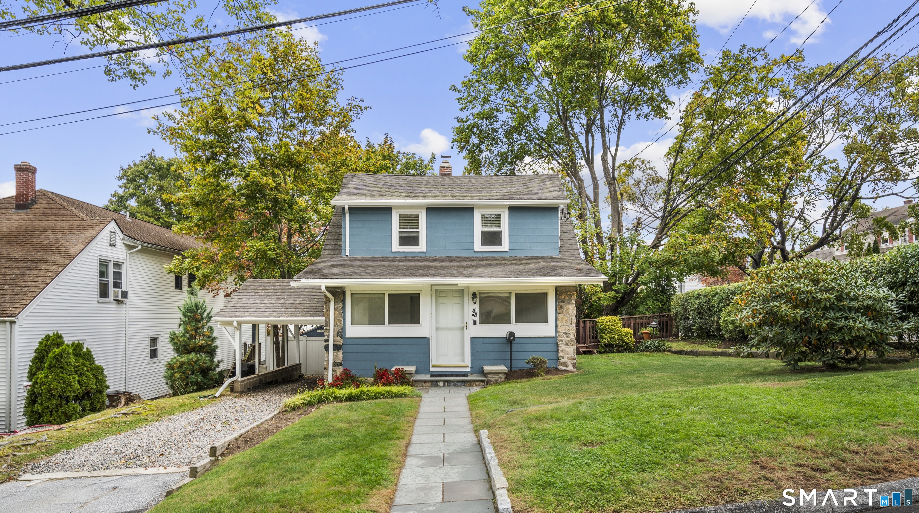 Welcome to this charming 3-bedroom Cape nestled in Stamford's sought-after Springdale neighborhood! Offering a versatile floor plan this inviting home combines comfort, charm and convenience. The main level features a bright and spacious living room which you enter via french doors from the sunny heated enclosed porch. An updated kitchen boasts granite countertops and new stainless steel appliances, while a first floor bedroom and full bath offer flexibility living options. Upstairs, you'll find two generously sized bedrooms and a second full bath. Additional highlights include: hardwood floors throughout, natural gas and a large basement with so many possibilities and an abundance of storage space, also a carport for covered parking! Step out onto the deck overlooking a serene, level backyard with plenty of room for entertaining, play or gardening, complete with a storage shed and pebbled area for your firepit! Approximately 1.1 miles from the Springdale train station, with easy access to school, shopping, dining, major highways and everything Stamford has to offer. A wonderful opportunity to enjoy the best of Springdale living!