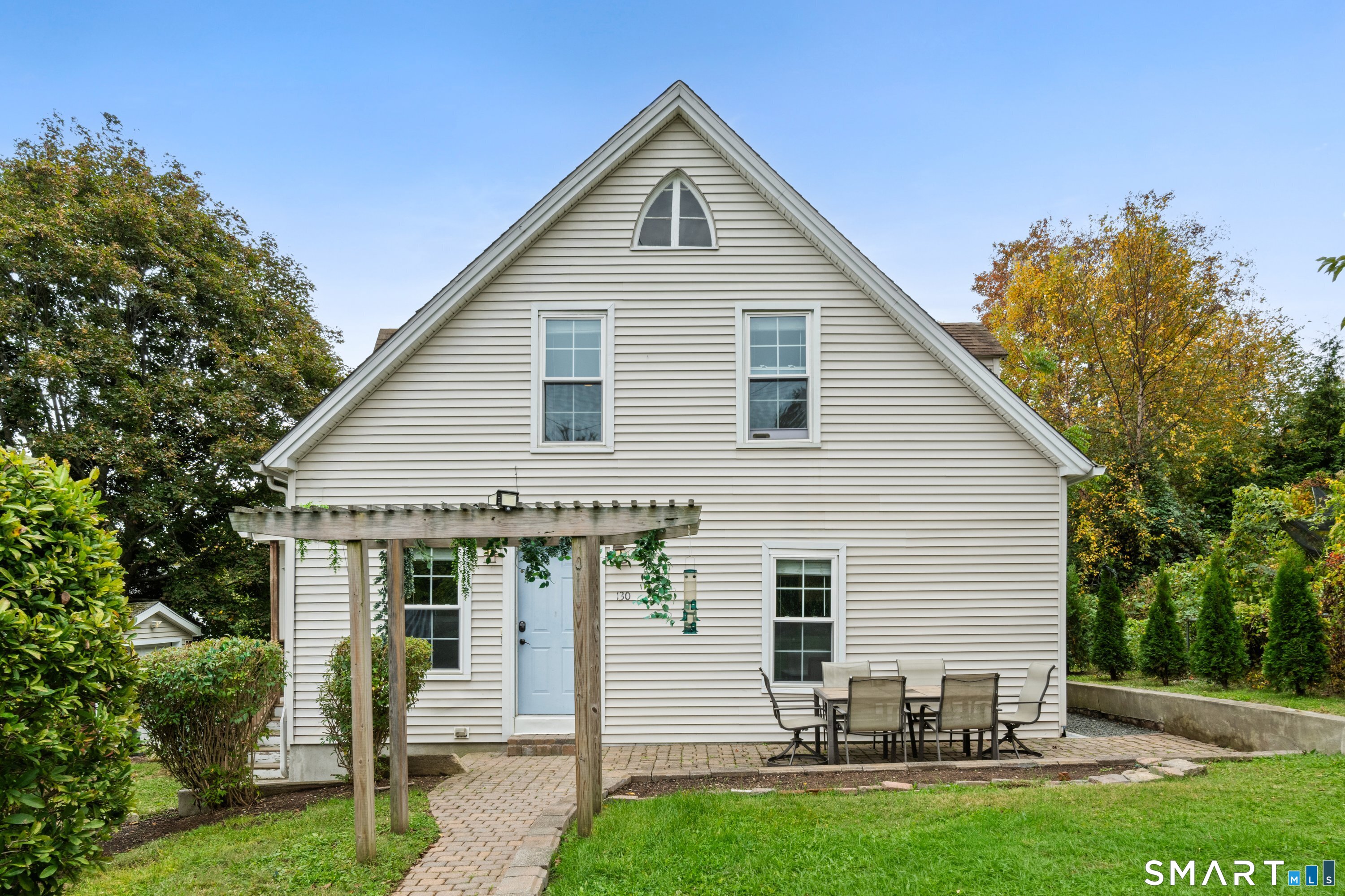 Welcome to this beautifully remodeled 4-bed, 2-bath Cape Cod-style home - a stone's throw from the desirable Spring Glen neighborhood. Rebuilt to the studs in 2017, this home pairs preserved character with modern style throughout. The main level offers an inviting open living and dining area with glowing hardwood floors. The eat-in kitchen integrates style & function with granite countertops, recessed lighting, a casual breakfast bar, tiled flooring, stainless steel appliances, and generous built-in cabinetry. Two sunlit, hardwood-floored bedrooms complete the first floor for easy single-level living. Upstairs, two additional bedrooms await, including a primary bedroom with a spacious walk-in closet. The second upstairs room is impressively versatile - currently configured as a family room with its own kitchenette and walk-in closet, making an ideal in-law or private guest suite. Step outside to a private backyard retreat with a pergola, a dedicated gardening area, and a stone patio ready for an outdoor fire pit for cozy fall nights. Recent improvements include a new drainage system/curtain drain on the northeast side of the home, a roof that's nine years young, and a semi-new on-demand energy-efficient heating system. Ideally located just minutes from East Rock Park, the Farmington Canal Heritage Trail, and Whitney Avenue shopping and dining, with easy access to Yale University, Albertus Magnus College, and I-91 for a quick commute into New Haven... Tenants vacate 11/30.