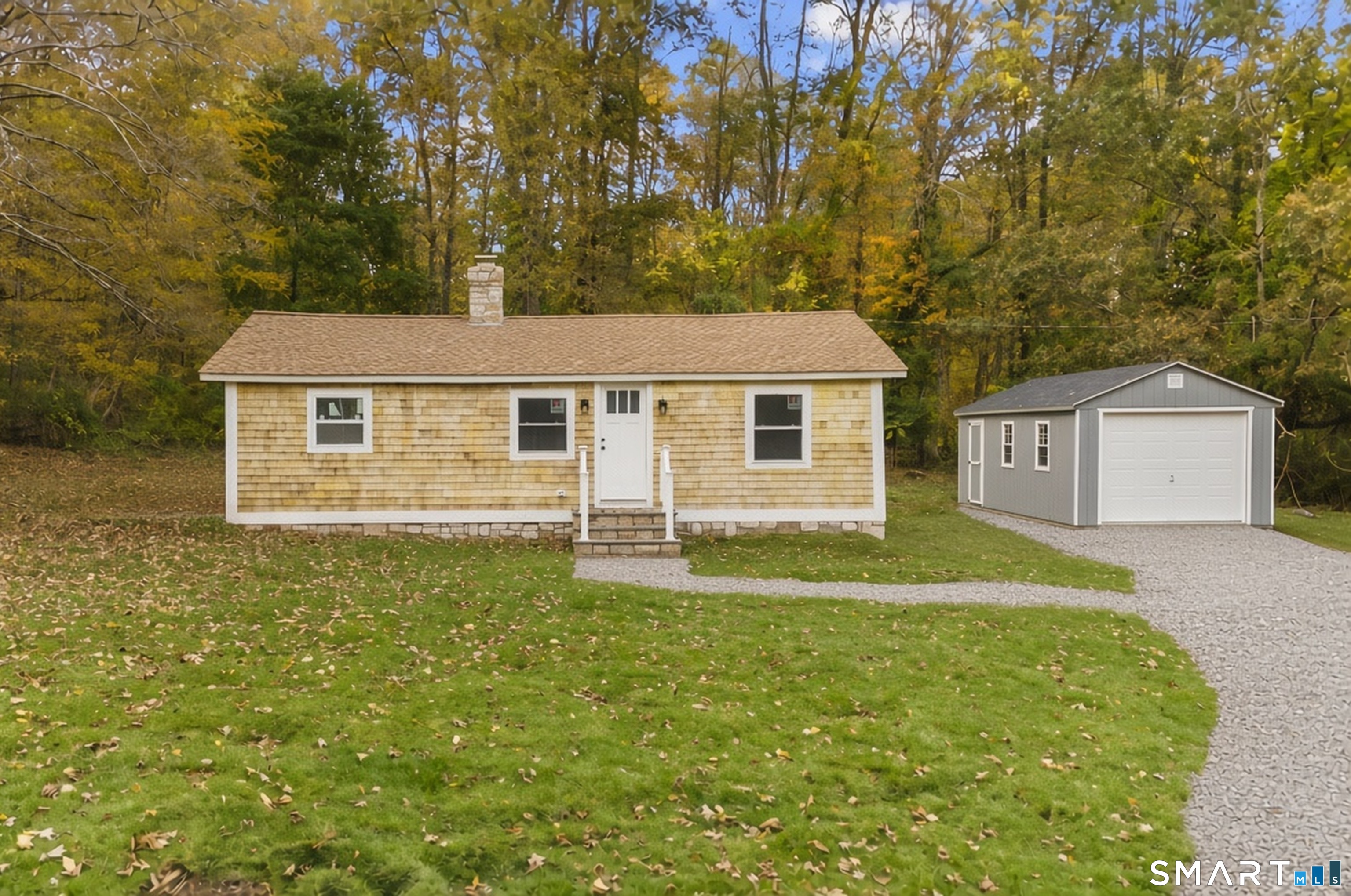 Welcome to 52 Anthony Lane, a fully renovated 3-bedroom, 1.5-bath ranch on a private, wooded acre in Westbrook. Brand new upgrades across the home: a brand-new roof, new siding and windows, and new electrical with 200-amp service. Ductless mini-splits handle both heating and cooling, and electric baseboards add extra heat when you need it. Inside, the open living room and kitchen have vaulted ceilings, a skylight, recessed lighting and hardwood floors throughout. The kitchen has two-tone shaker cabinets, quartz counters, a marble backsplash, a farmhouse sink with a gold faucet, and stainless appliances, including a French-door refrigerator. The full bath is updated with modern tile and black fixtures. Outside, a gravel driveway, and plenty of room to enjoy the yard. It's move-in ready, close to the shoreline and I-95.