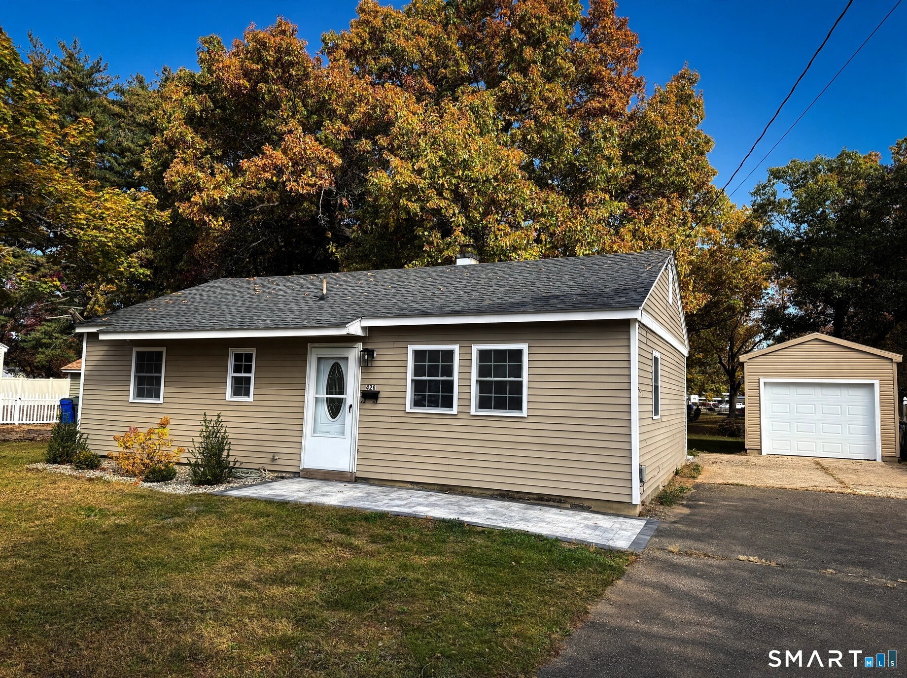 Welcome to your dream home nestled in the heart of Windsor Locks, CT! This charming 3-bedroom ranch is situated in a sought-after neighborhood, offering both tranquility and convenience. Every inch of this residence has been thoughtfully updated to meet modern needs while maintaining its warm, welcoming character.  Step inside to discover a stunning new kitchen that is complete with sleek cabinetry and countertops. Gleaming new flooring flows seamlessly throughout the home, enhancing the bright and open floor plan. Peace of mind comes easy with significant updates including a brand-new roof, siding, oil tank, patio, and walkway - ensuring years of maintenance-free living.  The beautifully landscaped yard features an expansive patio area perfect for outdoor entertaining or serene relaxation sessions. Just minutes away from local schools, parks, dining spots, and shopping areas; this location offers everything you need right at your doorstep. This great home borders a school and playground, with gate to the playground in the backyard. Great outdoor area for entertaining on the new patio and flat spacious lot.  This exquisite property blends suburban charm with contemporary upgrades perfectly-inviting you to create everlasting memories here. Don't miss out on this rare opportunity-schedule your private showing today!