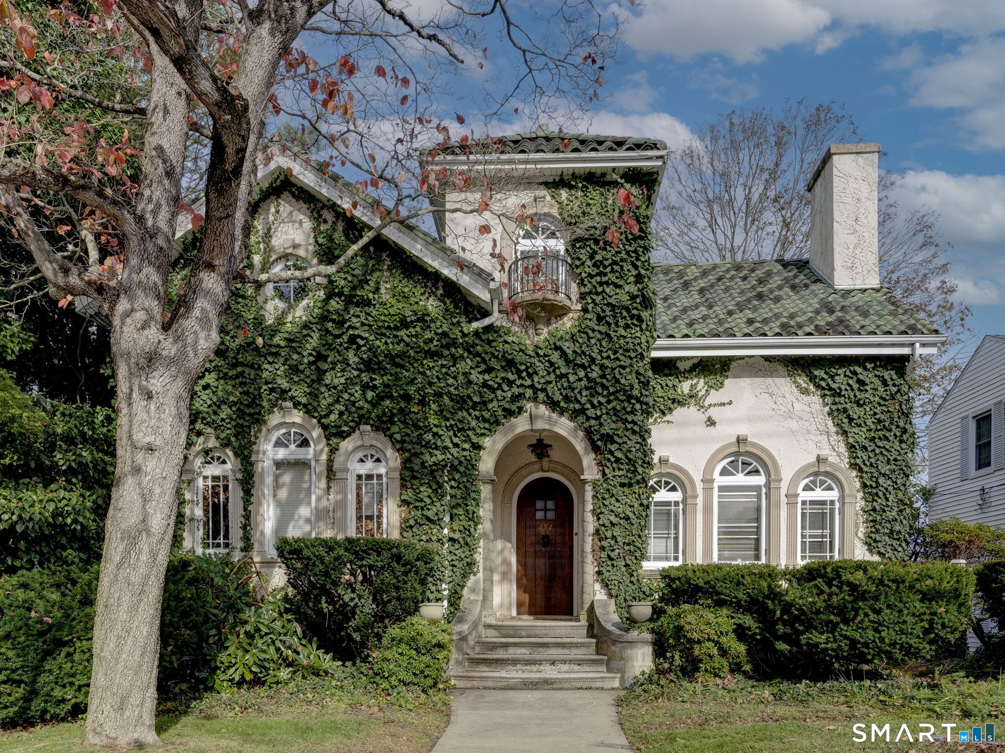Discover the timeless charm of this four-bedroom Mediterranean-style home, featuring classic stucco architecture, a beautiful terracotta-tiled roof, and lush ivy blanketing much of the facade, enhancing its old-world European charm. Admired for its architectural character for over a century, this distinctive residence showcases elegant arched doorways, Palladian windows, and French doors. The upper-level bonus study offers a picturesque view of the Thames River, adding to the home's unique appeal. Ideally located within walking distance of Yale New Haven Health Lawrence + Memorial Hospital and a marina and boatyard along the scenic Thames River, this property offers convenient access to Mitchell College, Connecticut College, Ocean Beach, Electric Boat, the Groton submarine base, Pfizer, and the upcoming Coast Guard Museum. Its prime location combines historic charm with easy access to local attractions, employers, and coastal amenities. Bring your vision to life and make this historic gem your own! Restore its timeless beauty and create a home that reflects your personal style while preserving its rich history and unique charm.