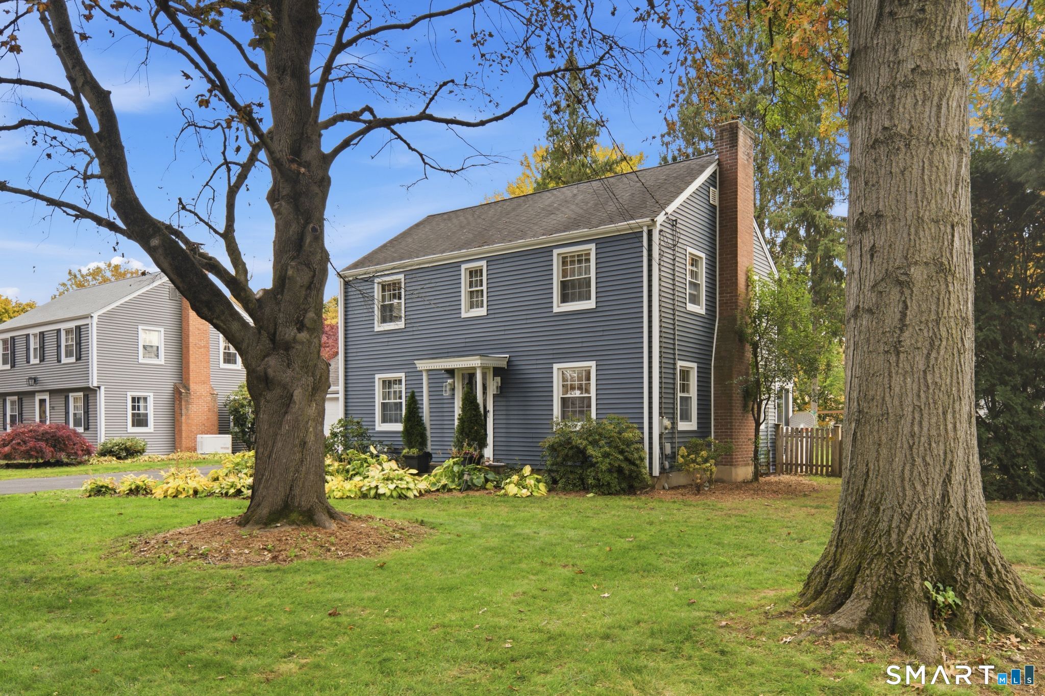 Welcome to 67 Longlane Road! This charming 3-bedroom Colonial offers a wonderful combination of classic character, thoughtful updates, and comfortable living in a convenient West Hartford location. The inviting living room features hardwood floors, crown molding, a cozy pellet stove, and plenty of natural light, creating a warm and welcoming space to relax or entertain. The beautifully updated kitchen features new white cabinetry, granite countertops, elegant white subway tile backsplash, stainless steel appliances, a sleek stainless steel vent hood, and luxury vinyl plank flooring. Just off the kitchen, a spacious mudroom and laundry area offers additional built-in storage and convenient access to the backyard. Upstairs, you'll find three bedrooms and a full bathroom featuring an updated vanity and classic tilework. The partially finished lower level provides additional flexible space, perfect for a recreation room, home office, or workout area. Outside, enjoy a fantastic, fully fenced, level backyard with plenty of room for entertaining, gardening, or outdoor activities. An attached one-car garage adds everyday convenience. Ideally situated within walking distance of Norfeldt Elementary School, Hall Hugh School and just minutes from West Hartford's shopping, dining, parks, and amenities, this home offers a wonderful opportunity to enjoy all that West Hartford has to offer!