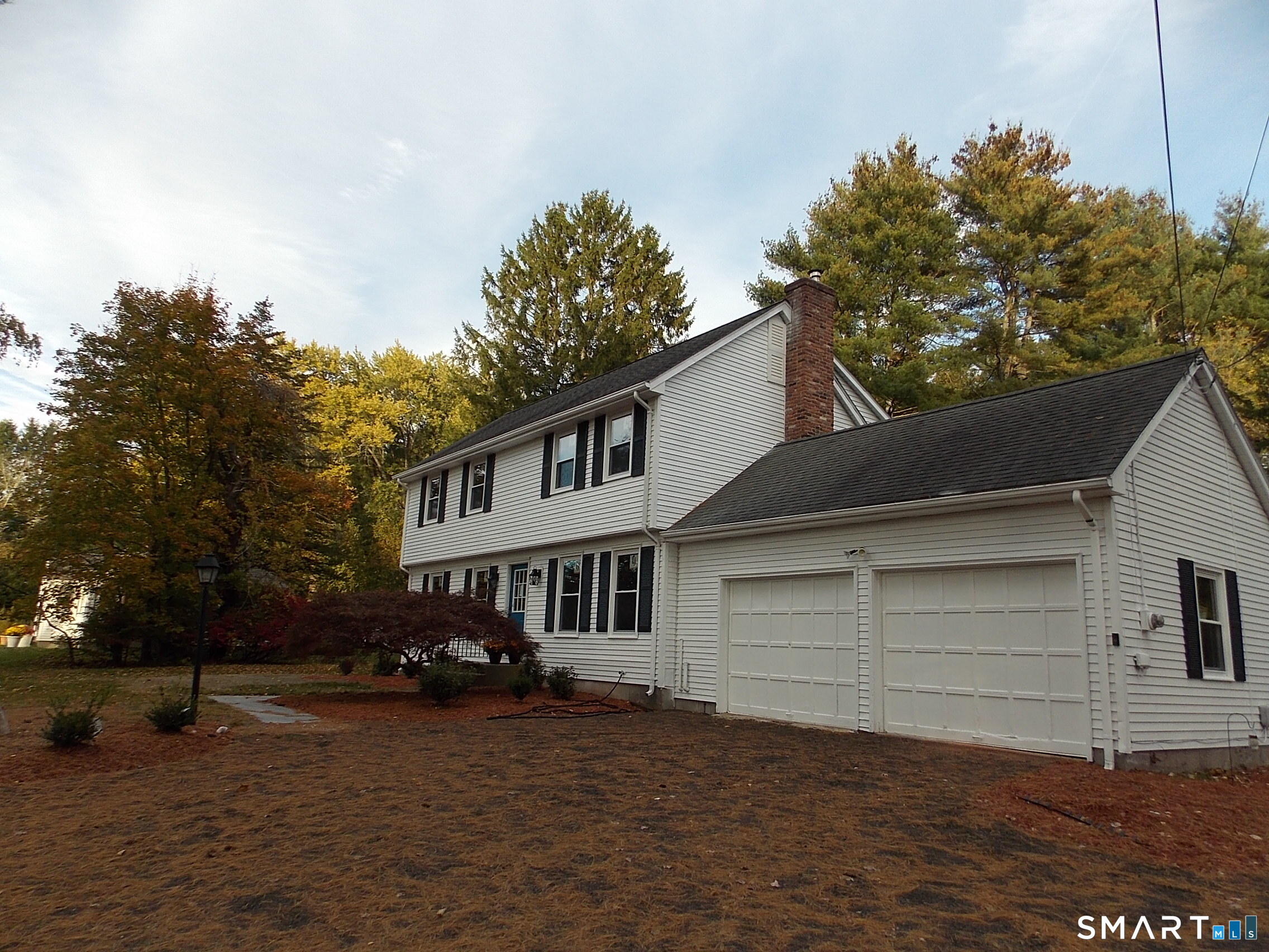 Welcome Home! 4 Bedroom 2.5 Bathroom Colonial on a Level Private Lot across from Park. Built by Crane construction this is the model home for Hampton Village and completely remodeled in 2026 this house is a short distance to Granby Center shops, dining and Salmon Brook Park. Open and Bright the house has 21 New Thermal Windows, newly refinished hardwood floors throughout, New Kitchen with all new S/S appliances and granite counters and 3 New Bathrooms.  New Recessed lights illuminate the new granite and new 5 burner stove with center gridle for steaks or pancakes in the morning. New Double S/S sink, new double door Refrigerator with ice maker completes this perfect kitchen. Off the kitchen is the laundry/bathroom with new tile floors and all new plumbing fixtures. The family room features a gorgeous glass front wood burning Hearthstone stove and wood burning fireplace which can heat most of the downstairs.  Upstairs are 4 spacious bedrooms and a magnificent primary bedroom that is 22 feet across with fantastic views of the park. Come and make this home yours today.