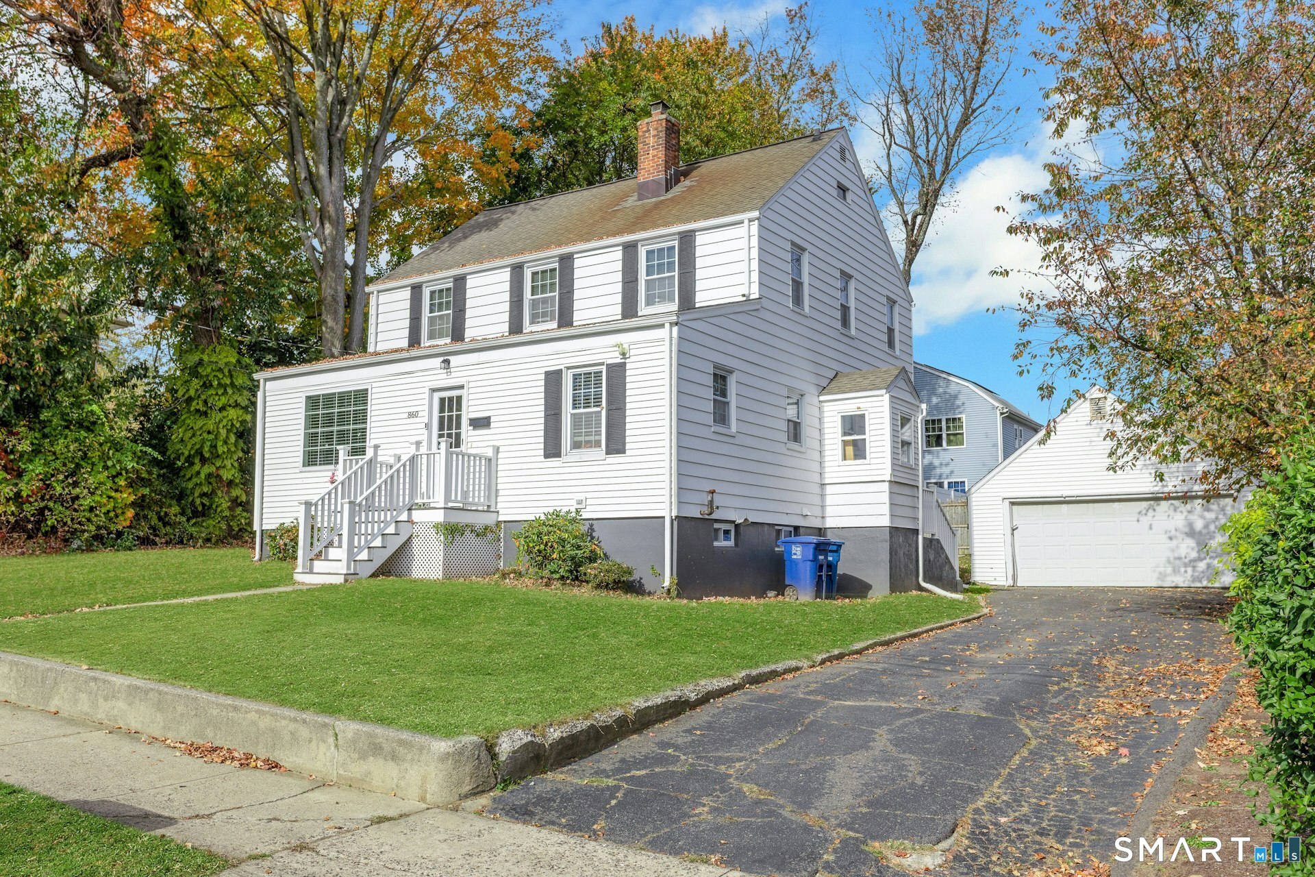 Excellent turnkey investment opportunity in Bridgeport's desirable North End! This spacious 6-bedroom, 2-bathroom Colonial is ideally suited for student rental investors, offering immediate rental income with tenants secured through 2028. Conveniently located near Sacred Heart University, the home features beautiful hardwood floors, abundant natural light, generously sized bedrooms, and an updated kitchen with white cabinetry, granite countertops, stainless steel appliances, and subway tile backsplash. The main level offers a bright, spacious living room, inviting dining area, and kitchen with additional space for casual dining. All six bedrooms are situated across the upper two floors, providing separation from the main living areas and an ideal layout for student housing. The partially finished lower level offers two additional bonus rooms, perfect for a home gym, media room, or flexible recreational space. Additional highlights include a detached two-car garage, ample driveway parking, and a spacious, level yard ideal for outdoor enjoyment. Conveniently located near shopping, restaurants, major highways, and local universities. With strong rental demand, an established tenant base, and immediate cash flow, this property presents an outstanding opportunity to acquire a stabilized, income-producing asset in Bridgeport's thriving student rental market!