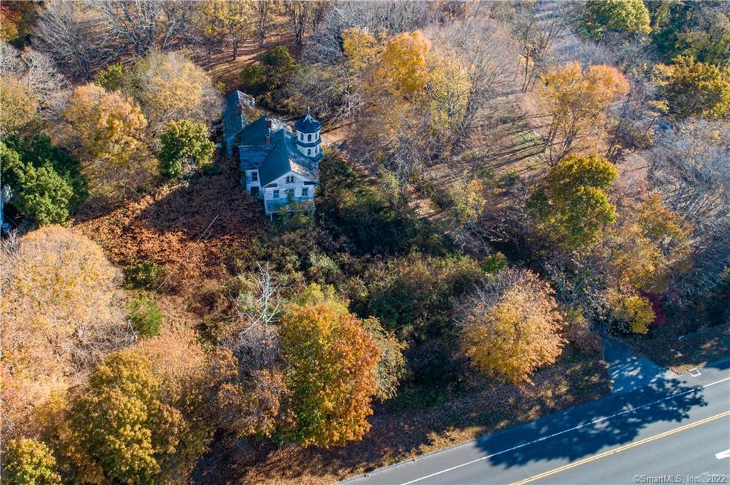 Beautiful property with spectacular views of the Connecticut River and Long Island Sound. This 1875 Victorian home includes 124 acres of land. Steeped in folklore, this home and the expansive land surrounding it was originally purchased in 1926 as farmland, which provided the gravel to fill in Boston's Inner Harbor and helped supply water to old steam engines. Now, nearly a century later and cradled between Route 9 and I-95, it is a Developer's Dream.....either commercial or residential. The many unique features this property offer's include views of the CT. River and a 20 acre lake with a beach and restrooms. Additional adjacent land also available. Extensive due diligence completed by seller's.