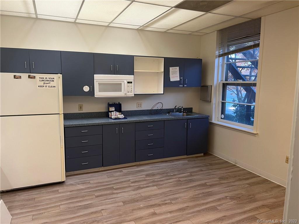 12 nice offices with kitchenette 4 bathrooms. Minutes to Tweeds Airport And Main Street East Haven . Large parking lot Two-story appox 2500 ft.? on each floorLI 3 Zone