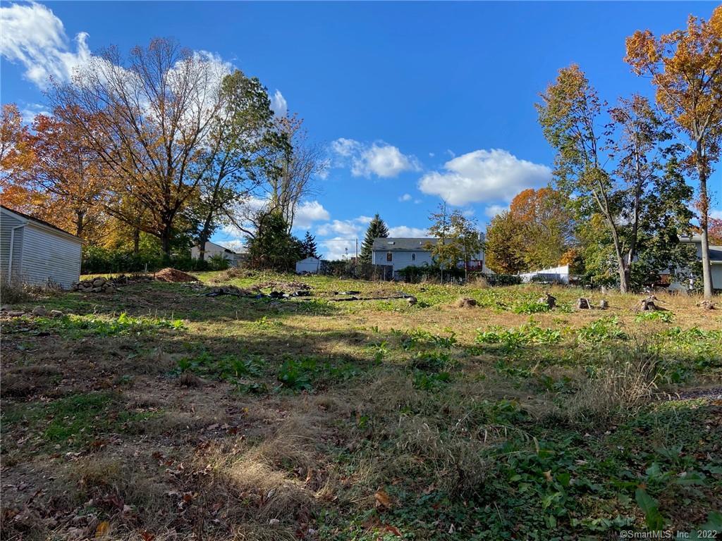 Don't miss out on this opportunity to build your dream home on this beautiful secluded lot that's tucked away in a well established neighborhood. Conveniently located off Whitney Ave where you can enjoy shopping, dining, or visiting Sleeping Giant Park. Easy commute to both Quinnipiac & Yale Universities. This lot has been mostly cleared and is ready to go. City water and city sewer are in the street. Gas is also available in the street, but not up to this property at this point. Current owner has approved plans to build a new home which are shown and attached to this listing.