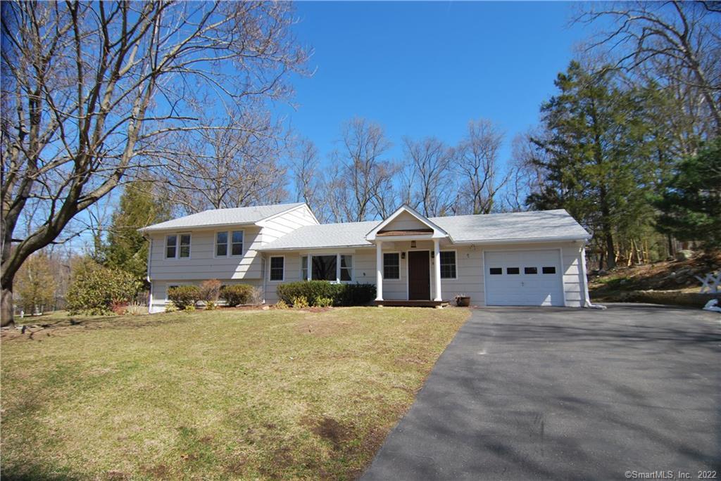 Beautifully updated split level, interior just painted, spacious front foyer and open floor plan in main living areas. Newly remodeled alley kitchen hosts breakfast bar, granite counter tops, plenty of under and over counter space. Finished walk out basement provides for optimal functionality. Paved driveway to one car garage; plenty of parking area outside. Meticulously maintained by homeowner. Level lot with plantings and plenty of privacy in back yard. No pets or smoking.