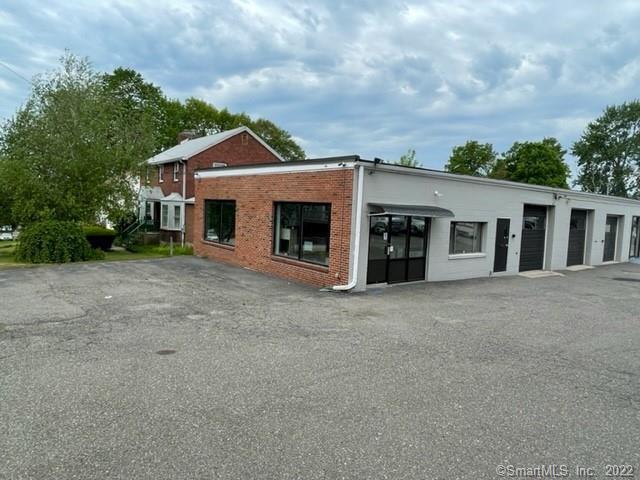 Rare opportunity to own a free standing property on East Main Street. This rock solid building is currently used as the home of Northwest Transit Bus Company. Tenant will stay in place on a month to month basis for as long as is mutually agreed upon. This property can continue to be used for an automtive use, or converted to retail or office. An additional residential parcel is also available for purchase which could make this an ideal development site. Access onto the property is from East Main Street and also at the rear of the property onto Yorkshire Street. Yorkshire intersects with East Main at a ighted intersection