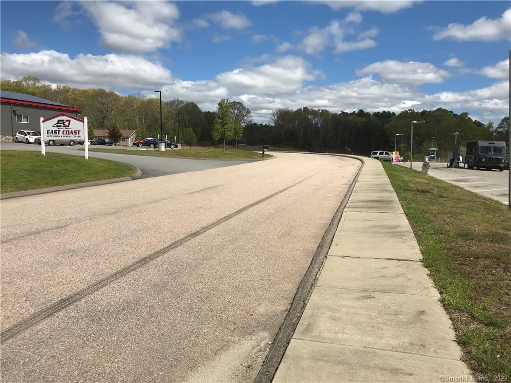 Five Acre Commercial Site offers a great opportunity to start your business. This site is visible as entered from high traffic State Route 138 aka Voluntown Rd. Enter just before East Coast Car Sales onto Business Parkway Rd, then turn into the cul de sac of Commerce Circle. This parcel is a combination of four lots to offer the full, five acres that are ideal in size and location for many types of businesses. Griswold wants your business and this parcel is priced to help you get started. This beautiful commercial site is graded and ready for development.