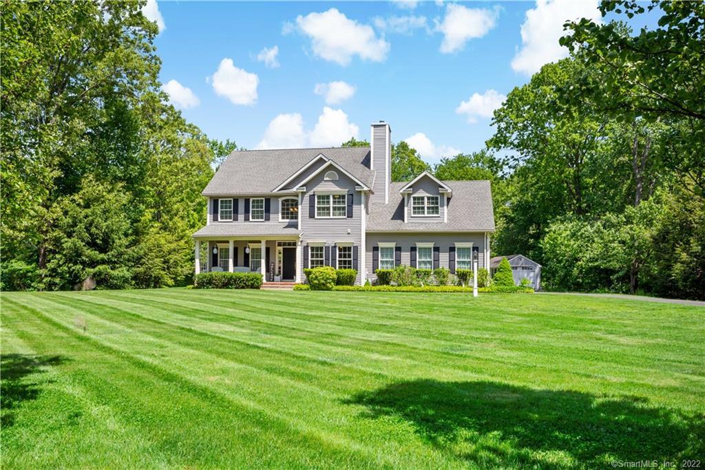 This custom built Colonial is hitting the market for the first time! As you turn onto Stonefield Rd, you are instantly greeted by a gorgeous stonewall that screams luxury! The home is set on a park like setting with an abundance of serene wildlife sounds to help you relax. Stare at the meticulously cared for lawn from the front porch while you curl up to your favorite book or sip on a delicious cocktail. Enter the home and delight in the open floor plan where brightness is abound. The floors are made with 5 inch red oak! Upstairs you will find 3 bedrooms and an oversized bonus room/bedroom. The backyard is straight out of HGTV! The Pergola (composite) covers the entire patio where you can spend countless hours talking, making smores or stargazing. The Koi pond will surely delight as an added ambiance. Details to not overlook: 1-Holiday lights package (all front windows and over the garage doors) - flip one switch and all the lights go on! 2-There is a light switch in the bedroom that turns on all exterior lights 3-Outside surveillance system complete with hard drive 4-Generator hookup 5-the sellers have the plans for an inground pool. Don't miss out on this gem of a home!