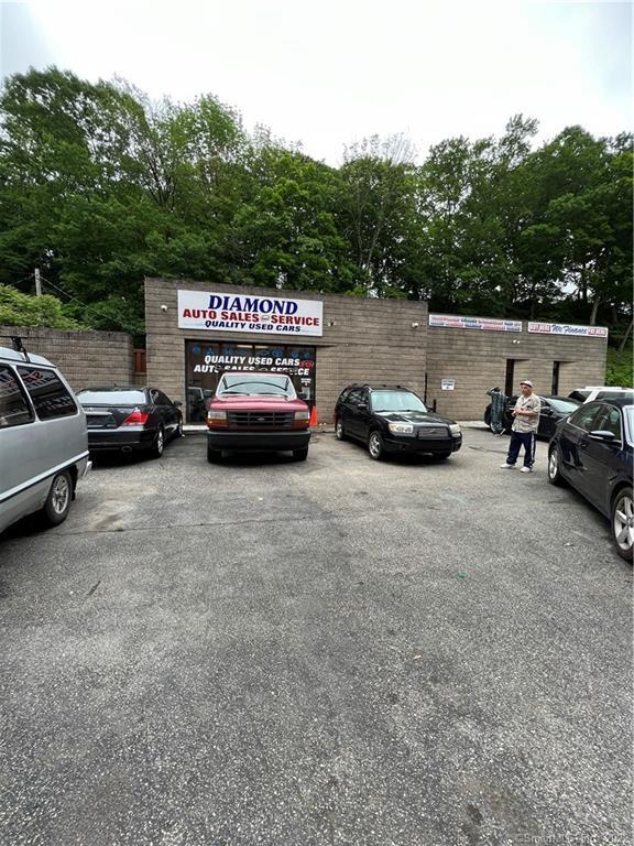 Profitable used car dealership with full service garage ! Building and Business! Completely renovated 5 years ago , new roof , new electrical service , new central air, one central air unit for office, and one central air unit for garage,  new gas furnace , new high efficiency demand gas hot water heater , 100 cars parking , 2 offices , 2 bathrooms , one regular bathroom with shower,  and 1 handicap bathroom! Don't miss the opportunity to own your business !