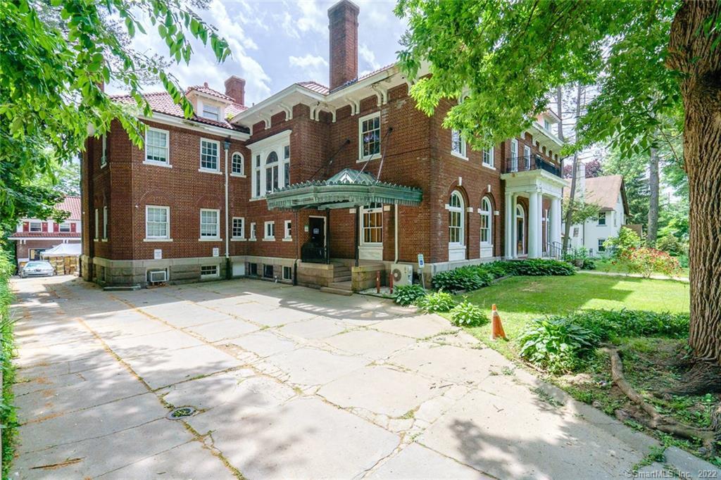 5/18/2023. back on market as buyer couldn't get funding.Huge 20, 000 SF colonial built in 1900 converted to a church in 2006 adjacent to famous Elizabeth Park, walking distance to Governors mansion!Original moldings & coffered ceilings with slate roof. Original design included 9 bedrooms/offices with 6 full and 2 half bathrooms. 4 of 9 bedrooms has en suite bathrooms. Split system air conditioning on first floor, 2 newer heating and hot water system (Weil-McLain) installed 2019. Stainless steel cooler, freezer and 6 burner commercial stove and double stainless steel sink located in the basement kitchen. 2 large multi purpose rooms capable of seating 150 persons in the partial finished basement.2Br 1 bathroom cottage apartment over 3 car detached garage.A gem... waiting to be restored.This is a church, please be respectful, do not touch personal and religious artifacts. Thank you