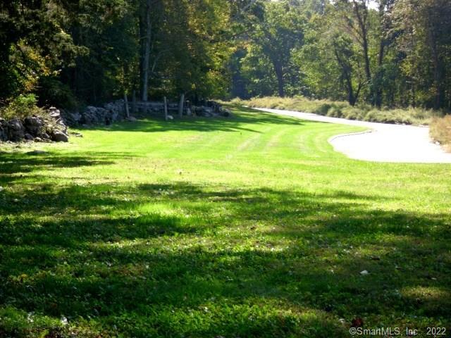 A gorgeous lot at the end of the cul-de-sac, this is one of the last two lots left at Whiting Farms Commons, Niantic's newest active adult (55+) community. All the other homes are completed and sold. This lot has all approvals and utilities ready to go! Road and underground utilities are in place. Site plan, septic, etc. are all approved. Lot is cleared and ready for you. Whiting Farms is ideally located in Niantic on a former farm with 26 acres of beautiful woodlands, stone walls and ponds. Close to the village, beaches and shopping. Call today!