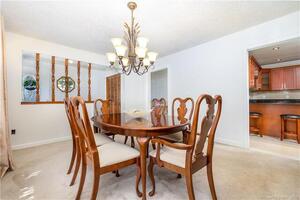And the formal dining room is large enough to seat 8, with easy access to the living room and remodeled kitchen.