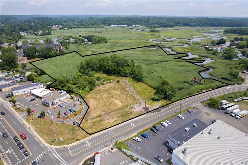 Excellent opportunity to build a 57, 120 square foot - 250 unit self-storage facility located on 2-main streets with high visibility & high-volume traffic. Approvals in place. 12+ acres of flat land ready for future development. Some wetlands. This is a great parcel of land with lots of potential. Survey and maps available.