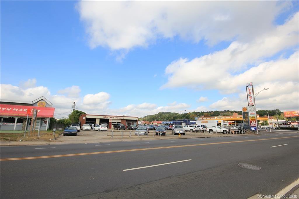 Prime commercial property located in Waterbury's Downtown/Enterprise District. Less than 1000 yards from Route 8 on/off ramp, walking distance to several national retailers and restaurants. Many commercial uses possible in this .52 acre lot with 156 feet of road frontage on West Main Street. Currently an established used car lot - business not for sale, property only. High traffic count. Trade fixtures not included, but may be negotiable.