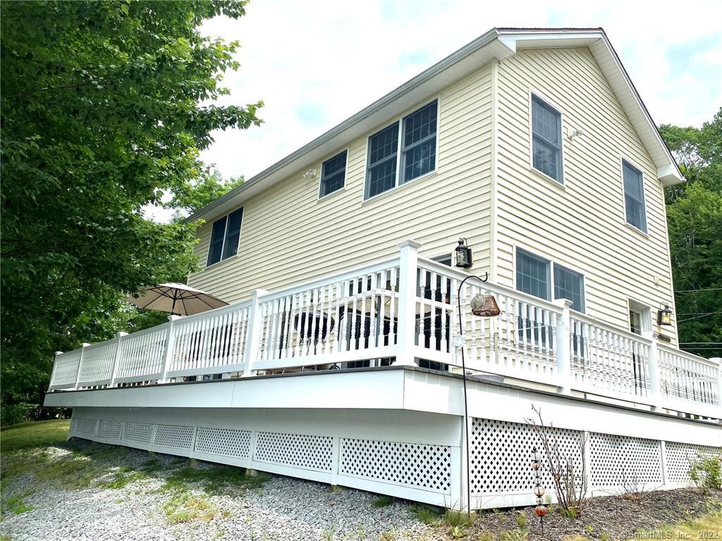 Up for sale for the first time this amazing waterfront home on beautiful Stafford reservoir. This home has a huge amount of water frontage. Outside you have a large driveway with detached 1 car garage. On the water you have your very own beach area, greenspace with fire pit for cool fall nights on the water. Head up to your absolutely enormous trex and vinyl deck perfect for those summer parties. Head inside to find a beautiful kitchen with granite counters, stainless appliances and the best part is water views from every room in the home. Off the kitchen you have a half bath, and then the kitchen is open concept to the dining room with amazing views while having breakfast and your coffee. Off the dining area past the stairs is a huge living room complete with custom ornate wood burning stove. Upstairs you have two great size bedrooms with water views from your bed and a beautiful full bath with granite topped vanity. Summer is calling, make this home yours now.