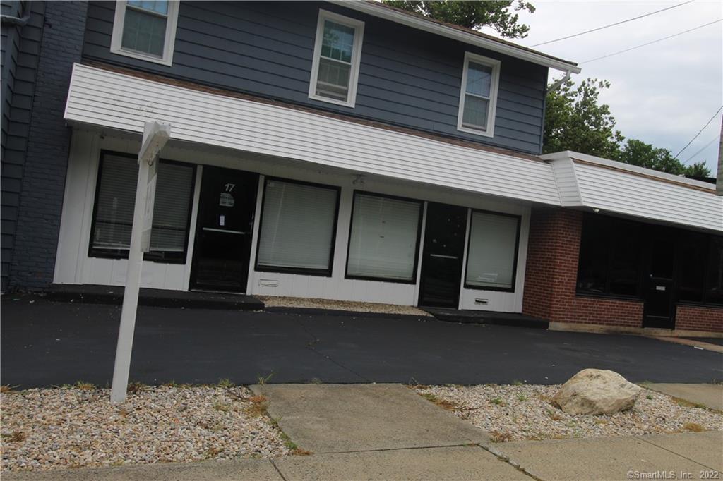 A commercial building with three store fronts and two residentials fully rented. the three store fronts collecting $1, 250, $1, 500 and $1, 500 and the two residentials are collecting a $1, 000 and $1, 000 for a total of $6, 250 a month.