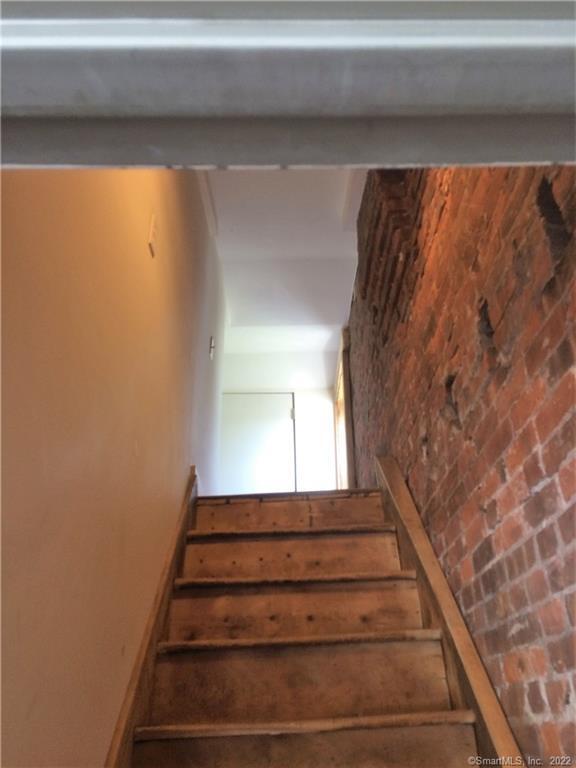 LOFT STUDIO APARTMENT FEATURES SLOPED CEILINGS, KITCHEN AND LARGE OPEN SPACE IDEAL FOR YOU TO LAYOUT ANY WAY YOU PREFER.