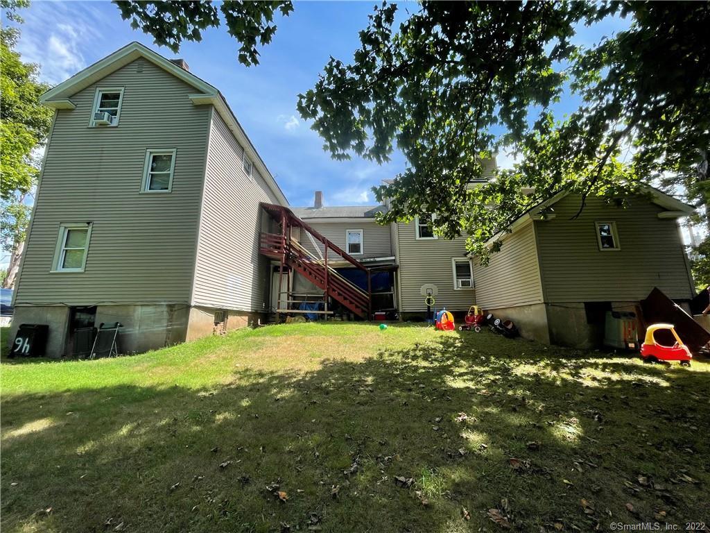 Investors take note, rare opportunity to own a 5 unit home! Each unit has 2 beds 2 baths with the convenience of natural gas heat. Rents are under market value generating over 4500 a month! Great Yard with off street parking. Shopping and Highways all located nearby.