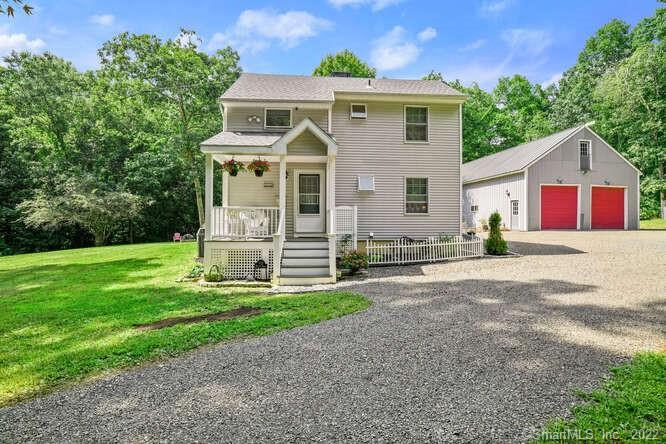 Updated home completely secluded from the road on over 5 wooded acres. Two bedrooms upstairs & potential for a third in the main level office (currently has no closet) OR in finished lower level complete with closet space. This home has quality Andersen windows & central AC. Sellers have cared for & maintained this house impeccably. Traditonal wood burning fireplace is the focal point of the family room with vaulted ceiling & loft hallway above. Don't fret over high oil prices this winter, this furnace runs on oil OR WOOD! Expansive sliders lead to Trex deck & pool. HUGE GARAGE/BARN with NEW roof. Effortlessly houses 6 cars & even more if you add a lift. High ceilings & a fully floored loft area for a total of 1800 sq feet! If you are a hunter you will love the walk in freezer at the rear of the building. Another outbulding on the property was once used for small animals as evident by the stalls but now utilized as a garden shed. Besides the extensive acreage, this house is a modest stroll to bucolic Nonnewaug Falls! If sequestered country life is what you are looking for, without being far from in-town essentials, this is YOUR HOME! A good portion of the driveway was just paved. Remainder is gravel leading up to the house. Unique property for a unique buyer who is in need of storage for his cars, collectibles, or other recreational vehicles. *Please do not drive down the driveway without an appt.*